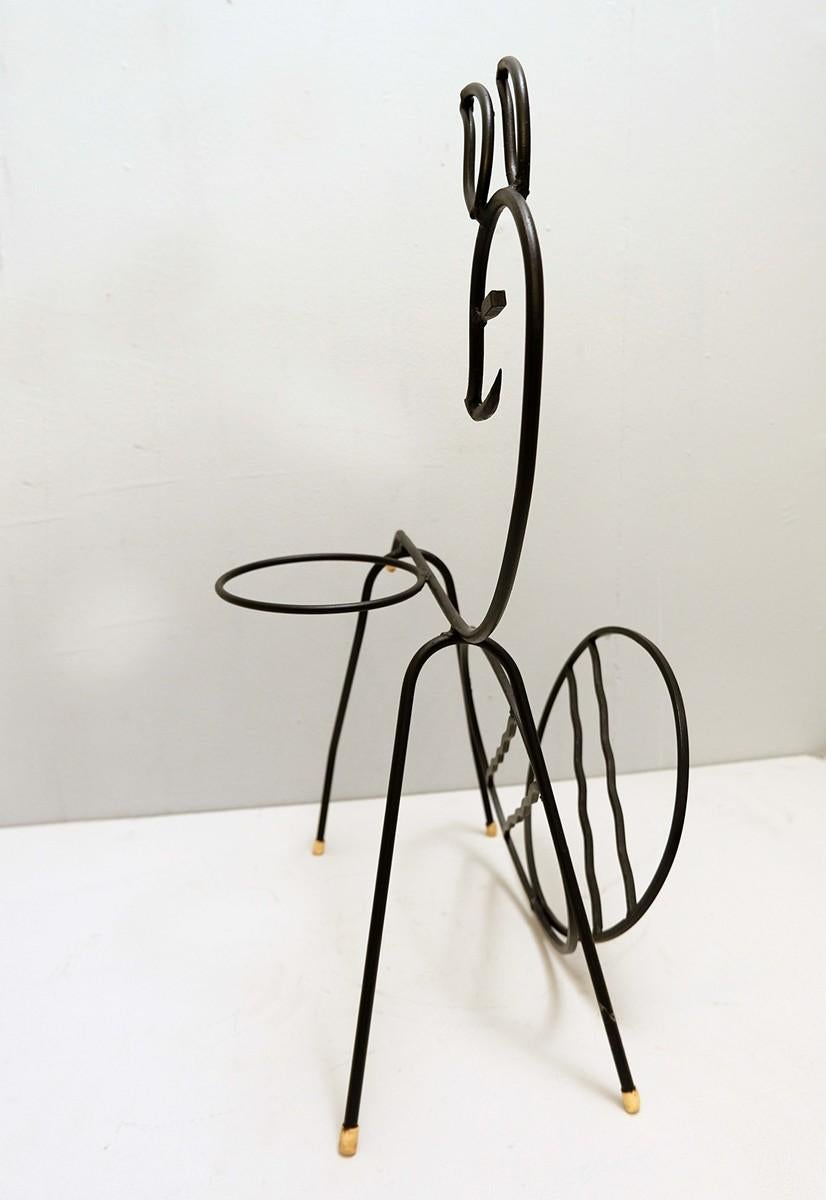 Black lacquered metal Bambi Magazine Rack and plant holder, 1960s.