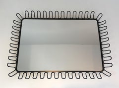 Black lacquered metal mirror