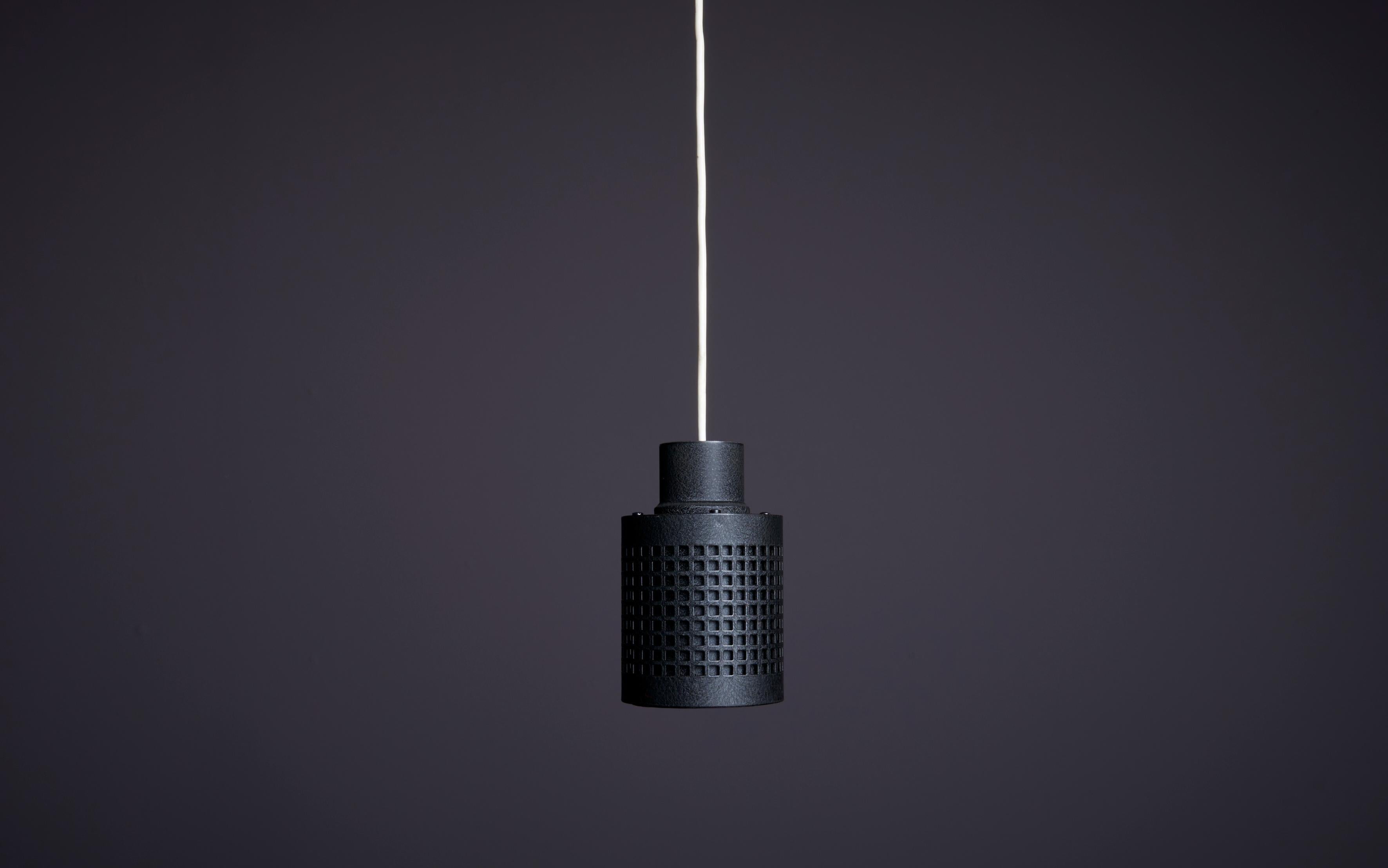 Pendant lamp by German manufacturer Leitz in black lacquered aluminum. Socket: 1 x E27. Please note: Lamp should be fitted professionally in accordance to local requirements.