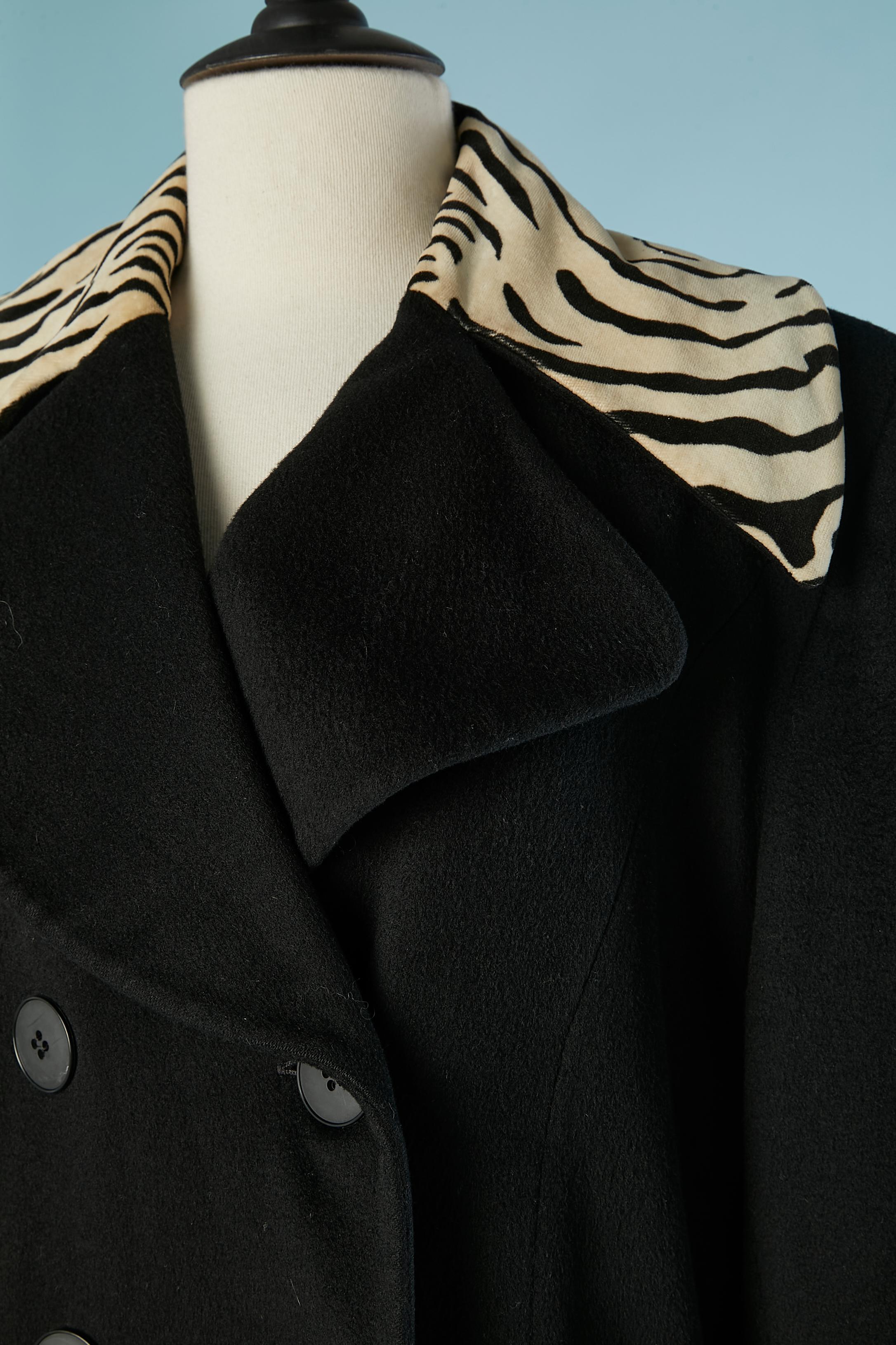Black lambswool coat with zebra velvet collar and cuffs. Branded rayon lining. 
Shoulder pads;
SIZE L