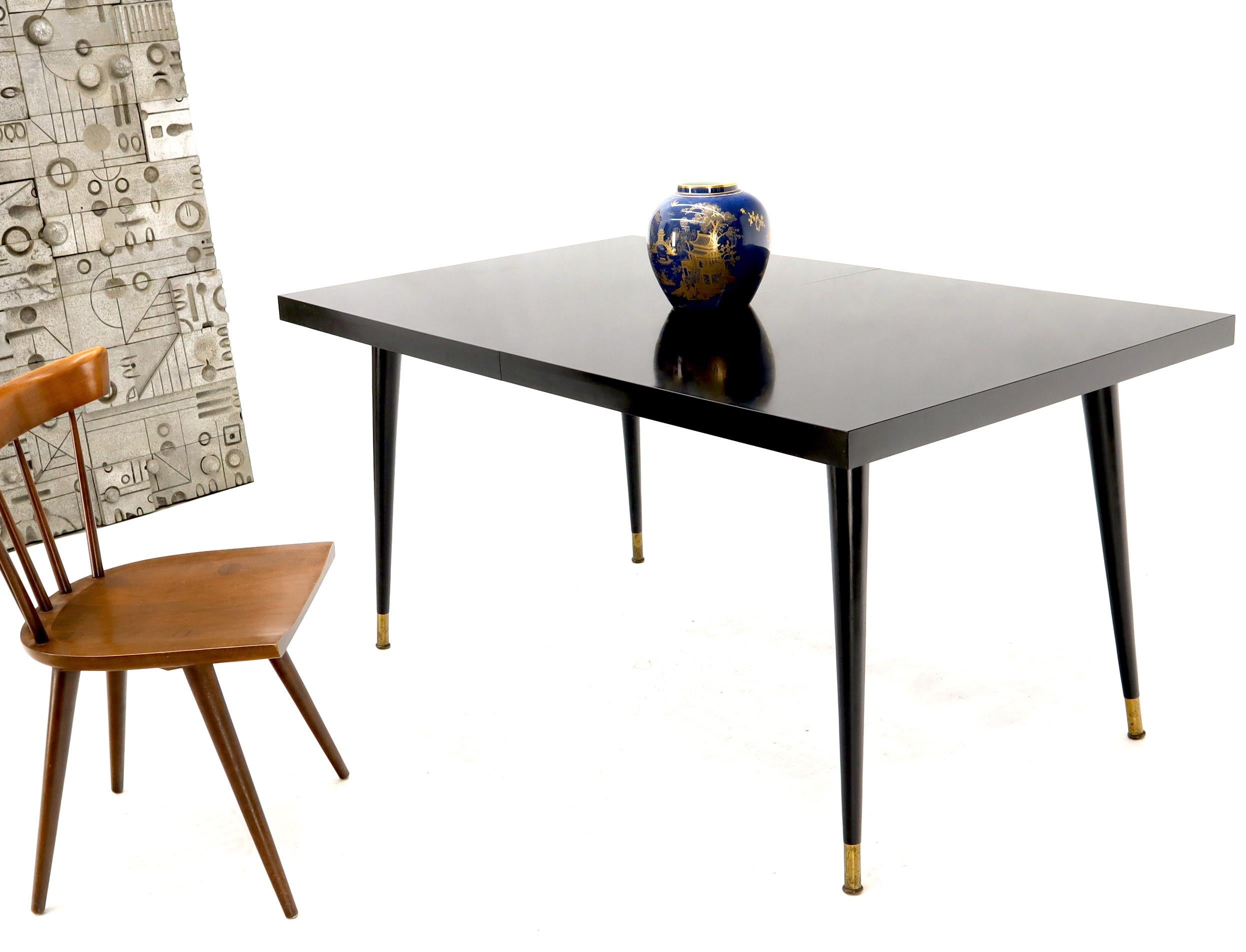 Black Laminate Tapered Dowel Legs Dining Table with Extension Board For Sale 1