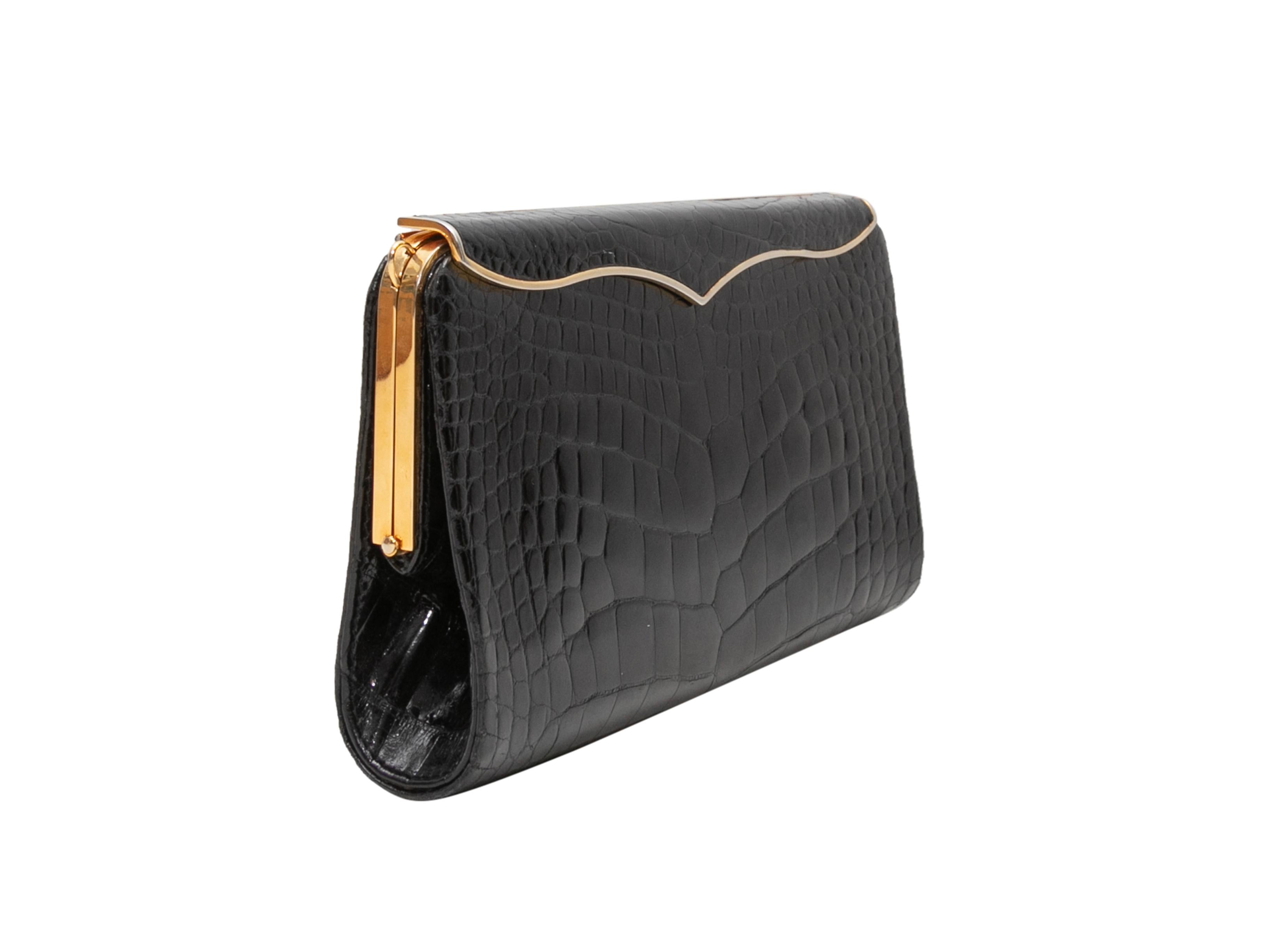 Product Details: Black Lana Marks Cleopatra Crocodile Evening Bag. The Cleopatra Evening Bag features a crocodile skin body, gold-tone hardware, optional crossbody strap, and top closure. 7.75