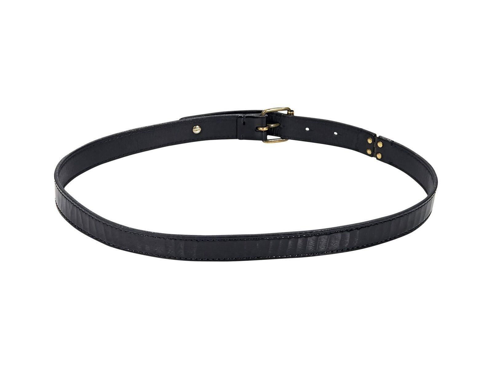 Product details:  Black patent leather belt by Lanvin.  Adjustable buckle closure.  Antiqued goldtone hardware.  34