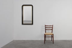 Black laquered and gilted wooden Louis Philippe mirror, France ca. 1850