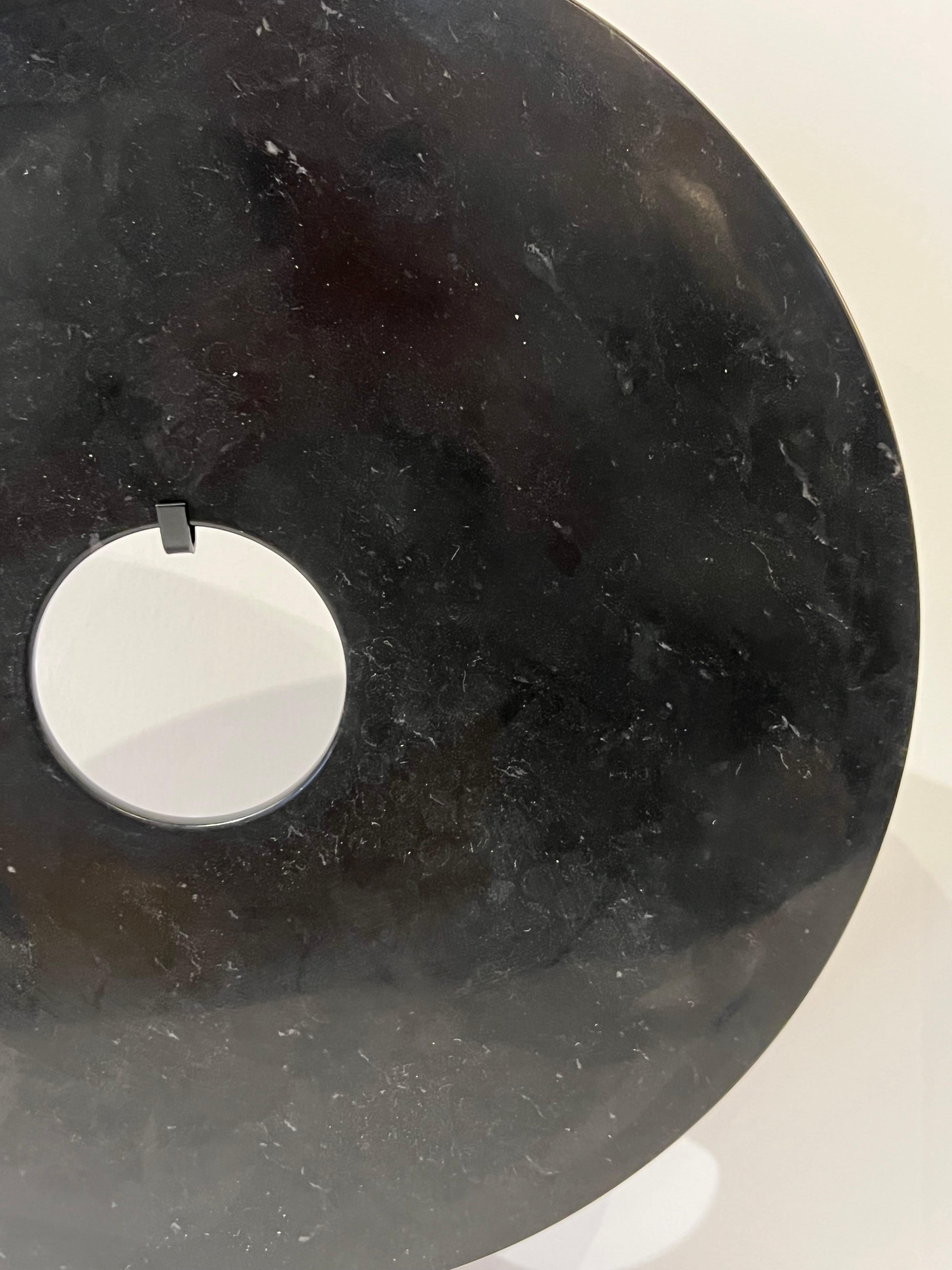 marble disk on stand