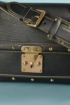 Black leather and gold-tone hardware Le Talentueux Louis Vuitton