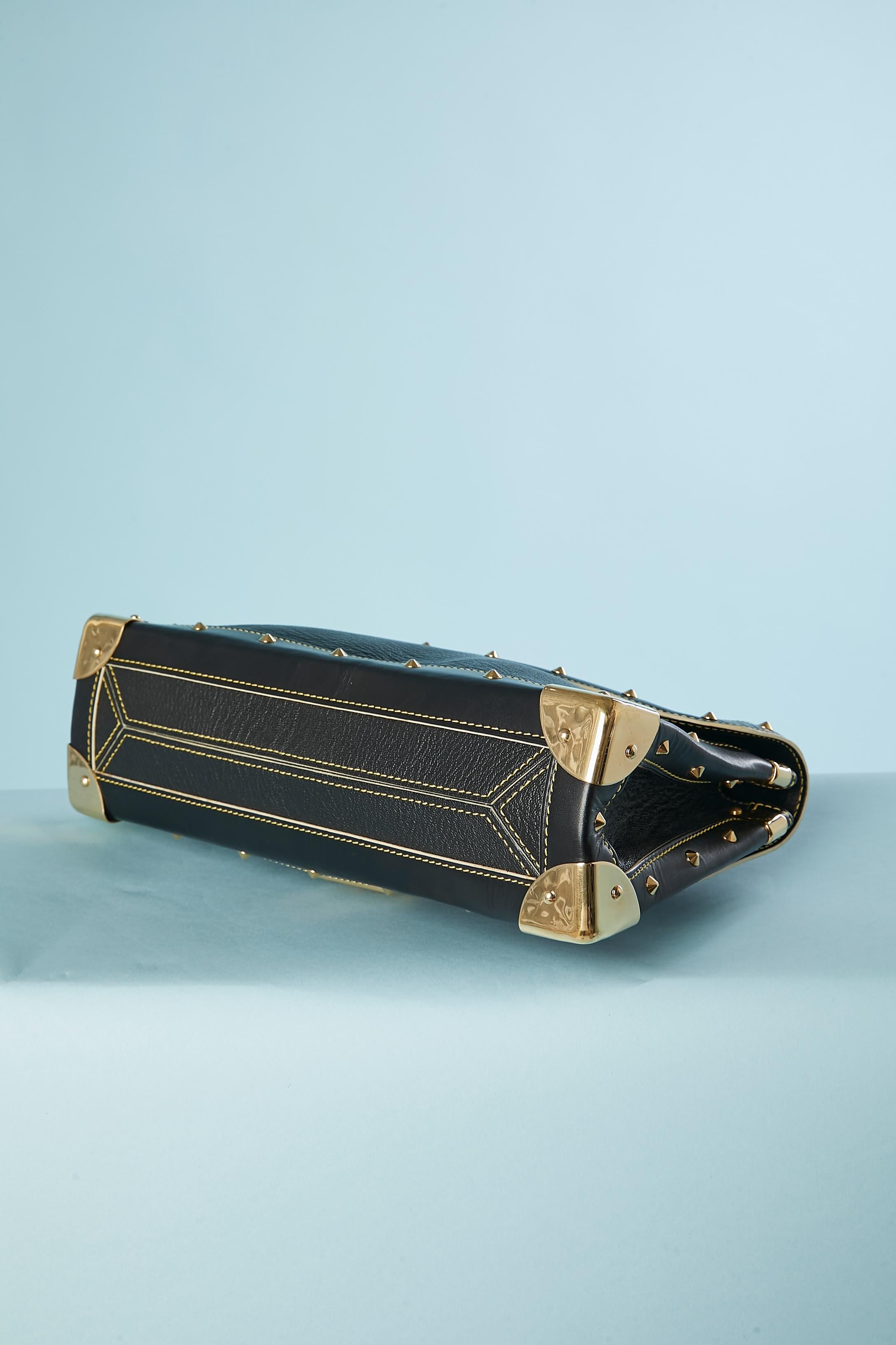 Black leather and gold-tone hardware Le Talentueux Louis Vuitton For Sale 1