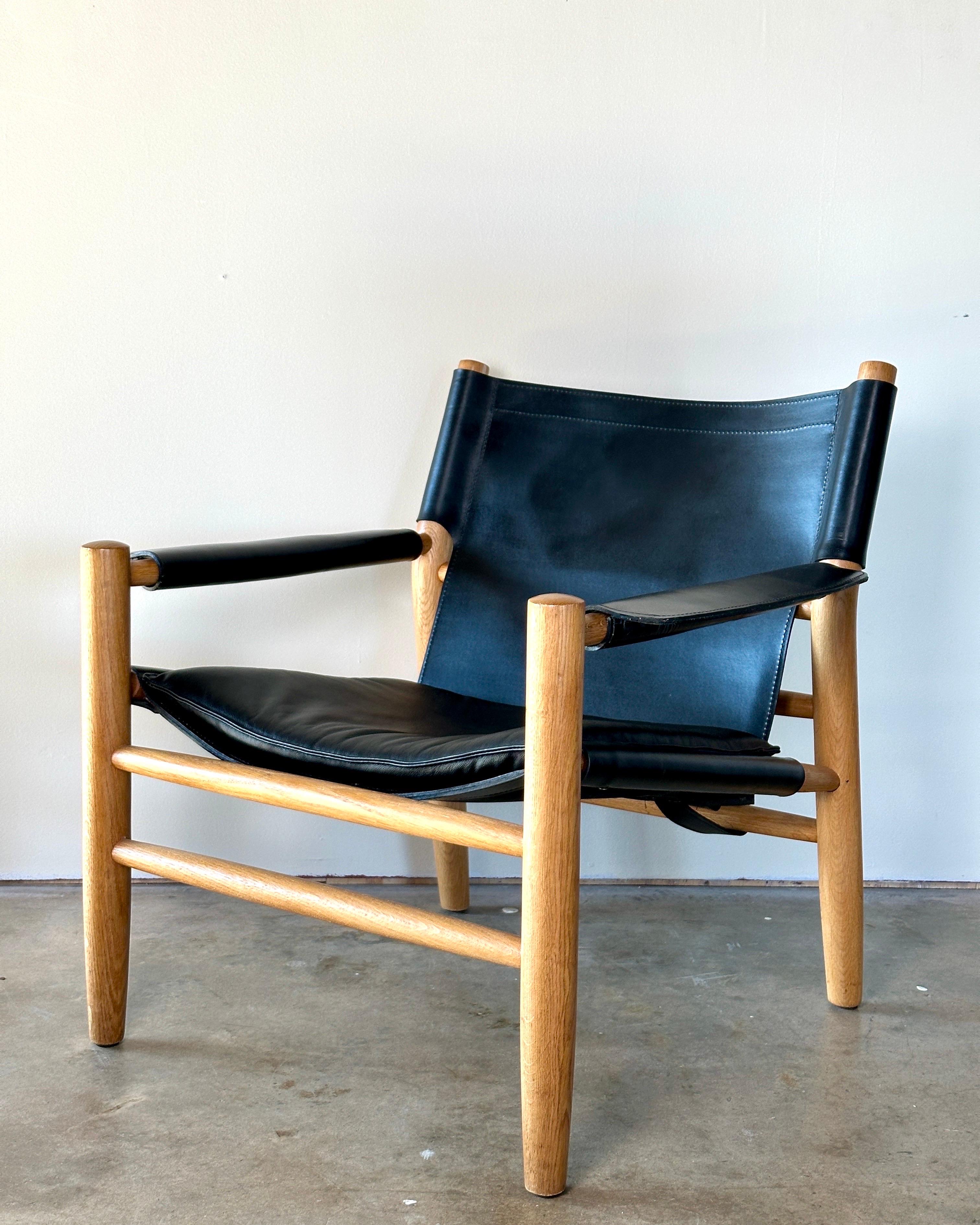 Pelle Sedia a fionda in pelle nera e Oak, di Dux in vendita