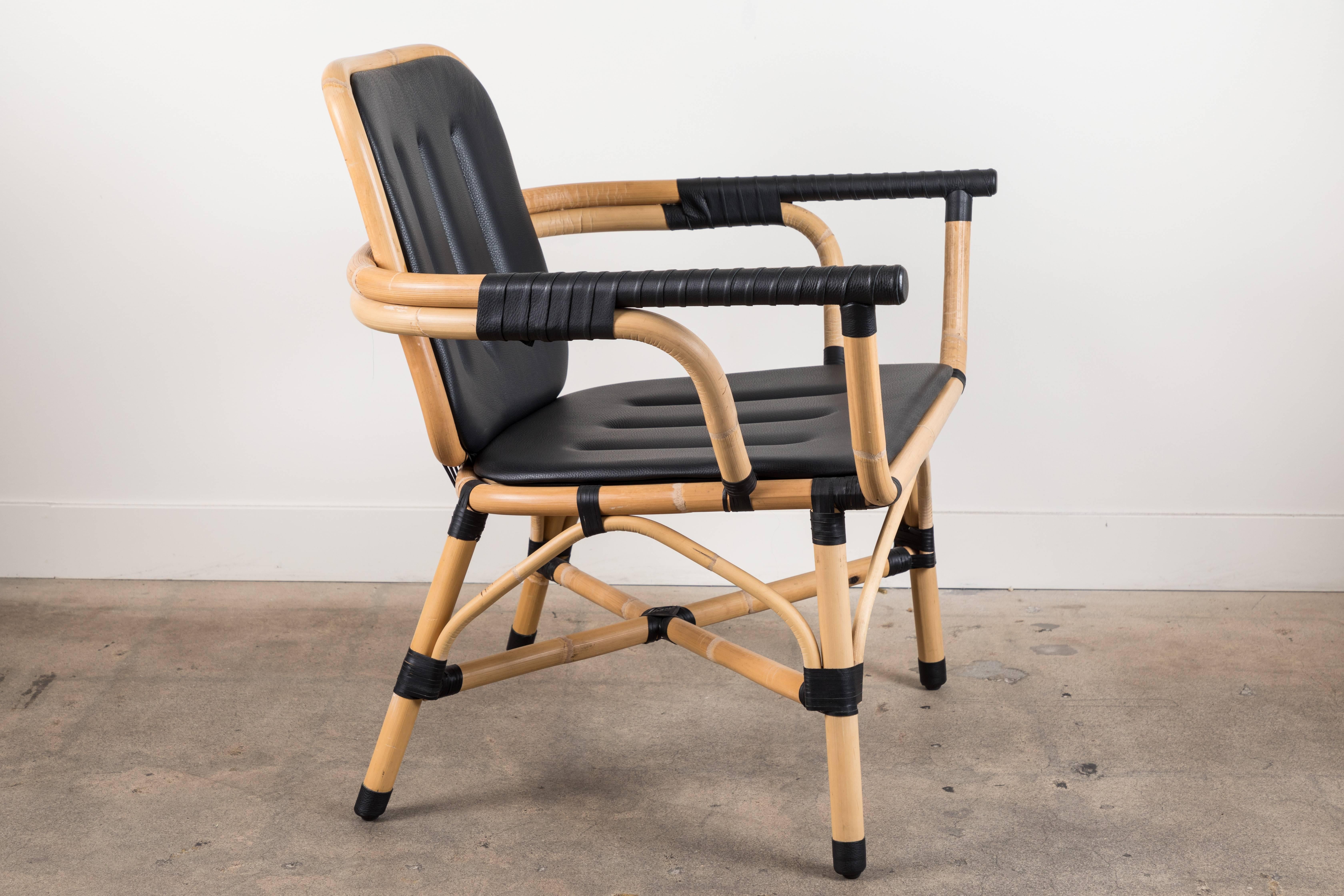 Mid-Century Modern Black Leather and Rattan Skin Armchair by Collection Particulière For Sale