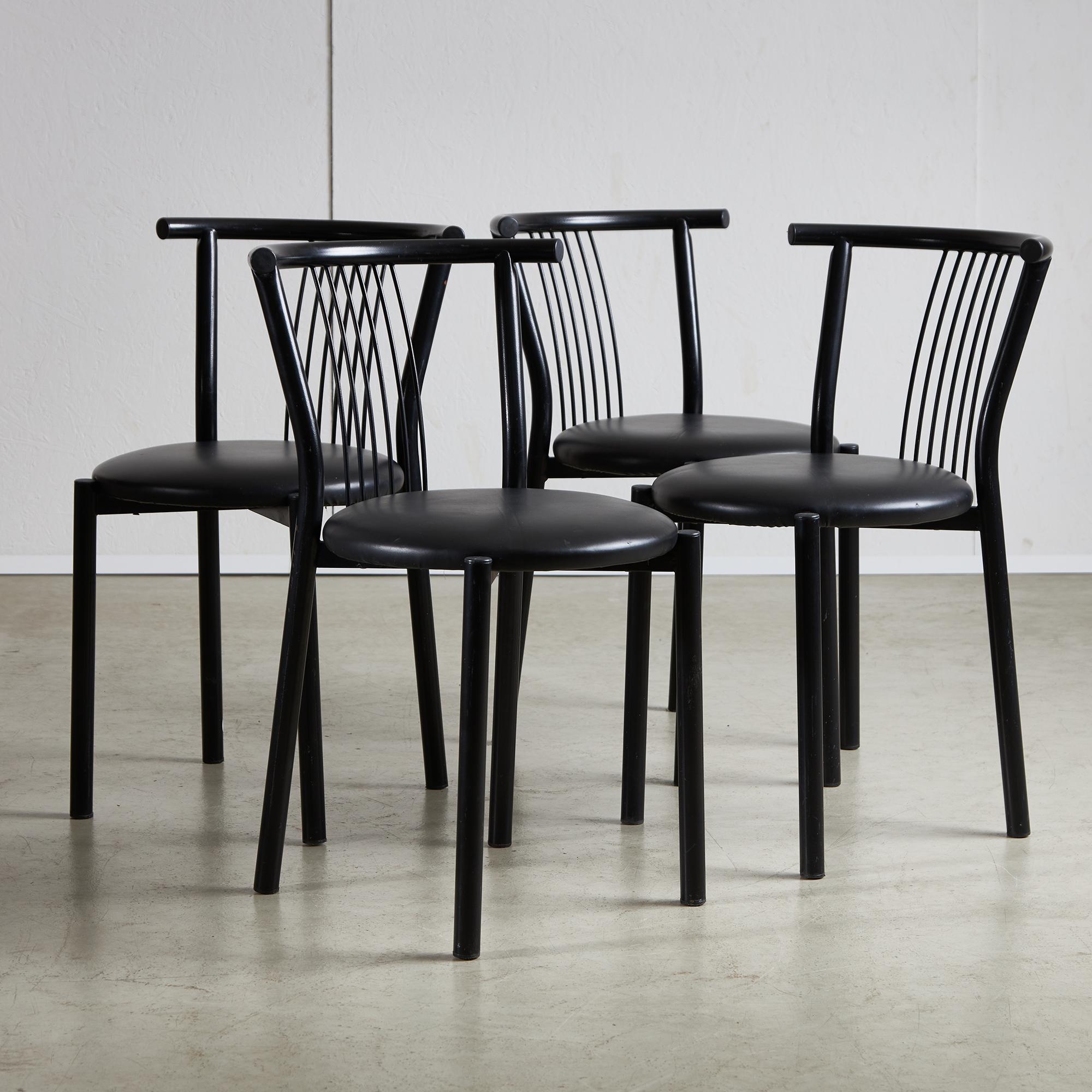 Elegance meets modernity in these stunning 1980s Italian dining room chairs. Their sleek design brings a sophisticated flair to any dining space, enhancing your décor. The black metal frame ensures durability and stability, while the softly rounded