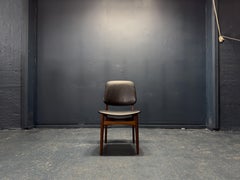 Black Leather and Teak Chair