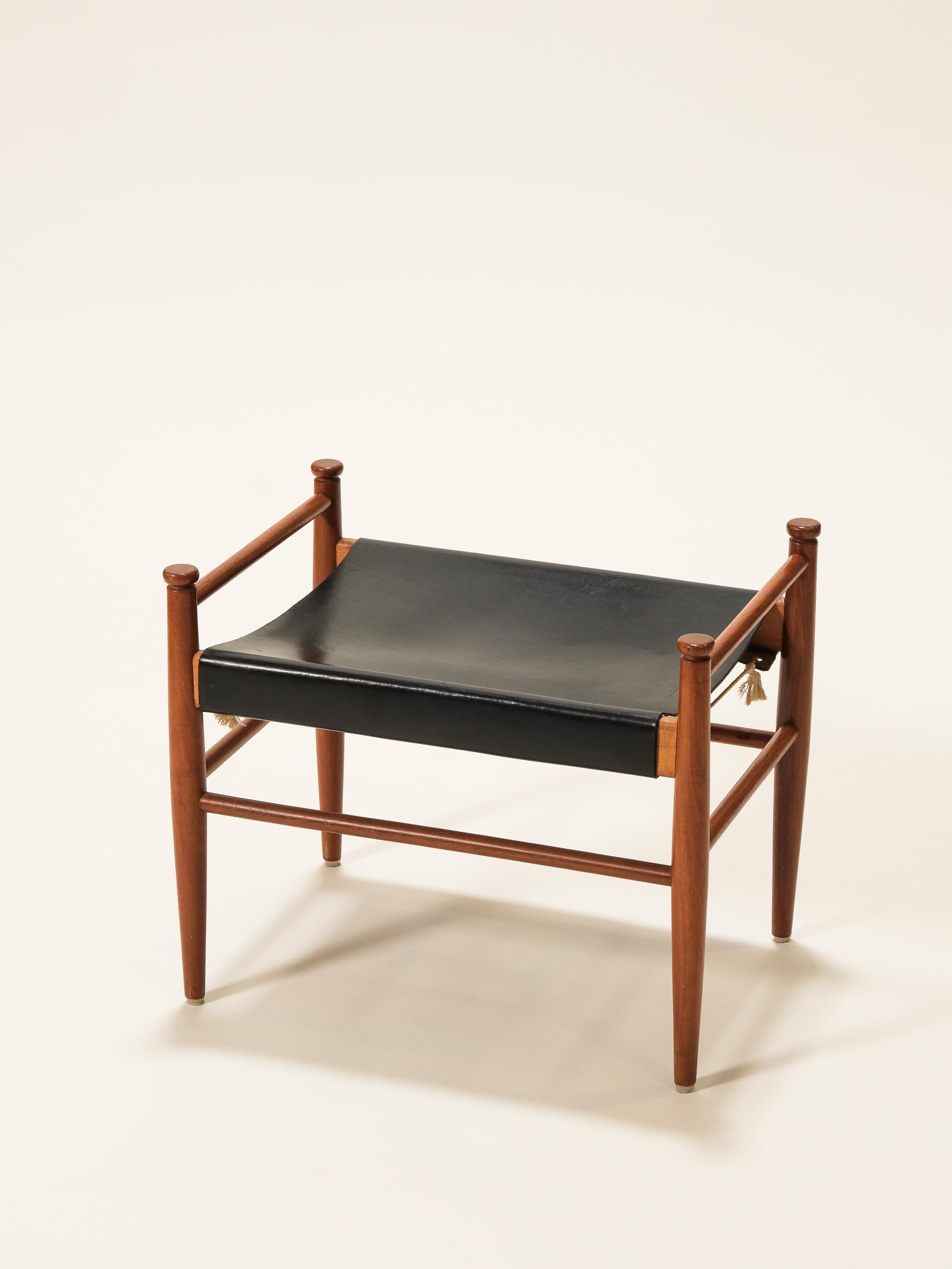 'Sudan' stool with a teak frame and original leather upholstery. Designed by Gillis Lundgren for IKEA. 1950s, Sweden. Very good original condition.