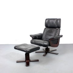 Black leather and wood armchair with ottoman - Kebe - Denmark - c. 1980