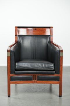 Black leather and wooden Art Deco design armchair