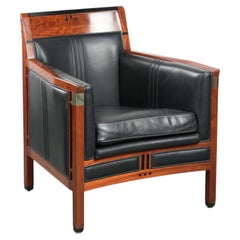 Black leather and wooden Art Deco design armchair