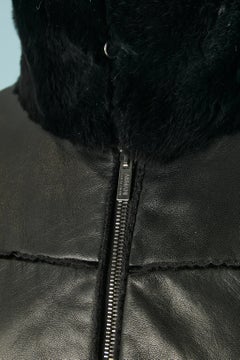 Black leather anorak with fur collar Armani Collezioni