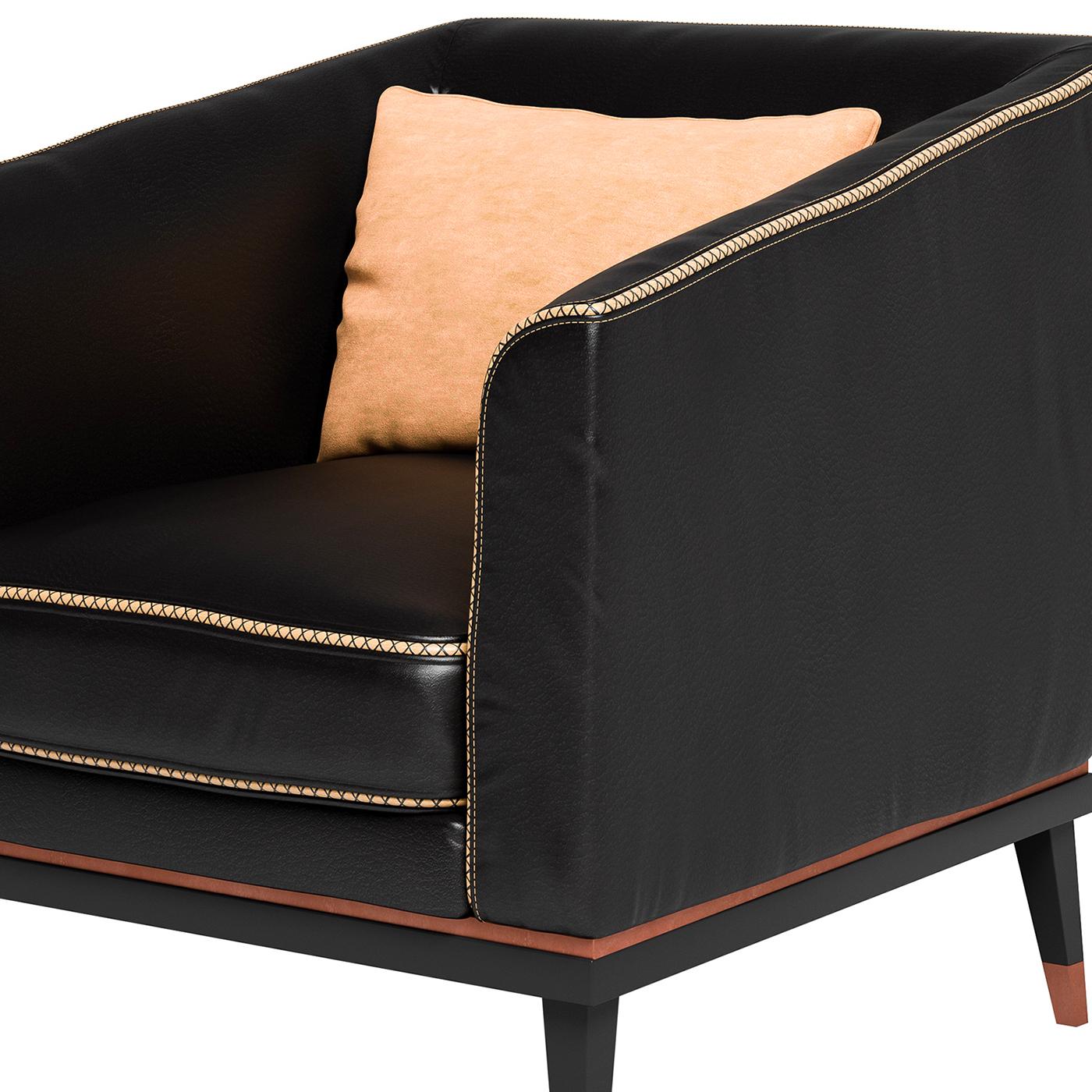 Dynamic lines and streamlined proportions characterize this exceptional armchair that will add modern flair and create a luxurious ambiance in a monochromatic, modern living room. Marked by a geometric silhouette with straight armrests and back,