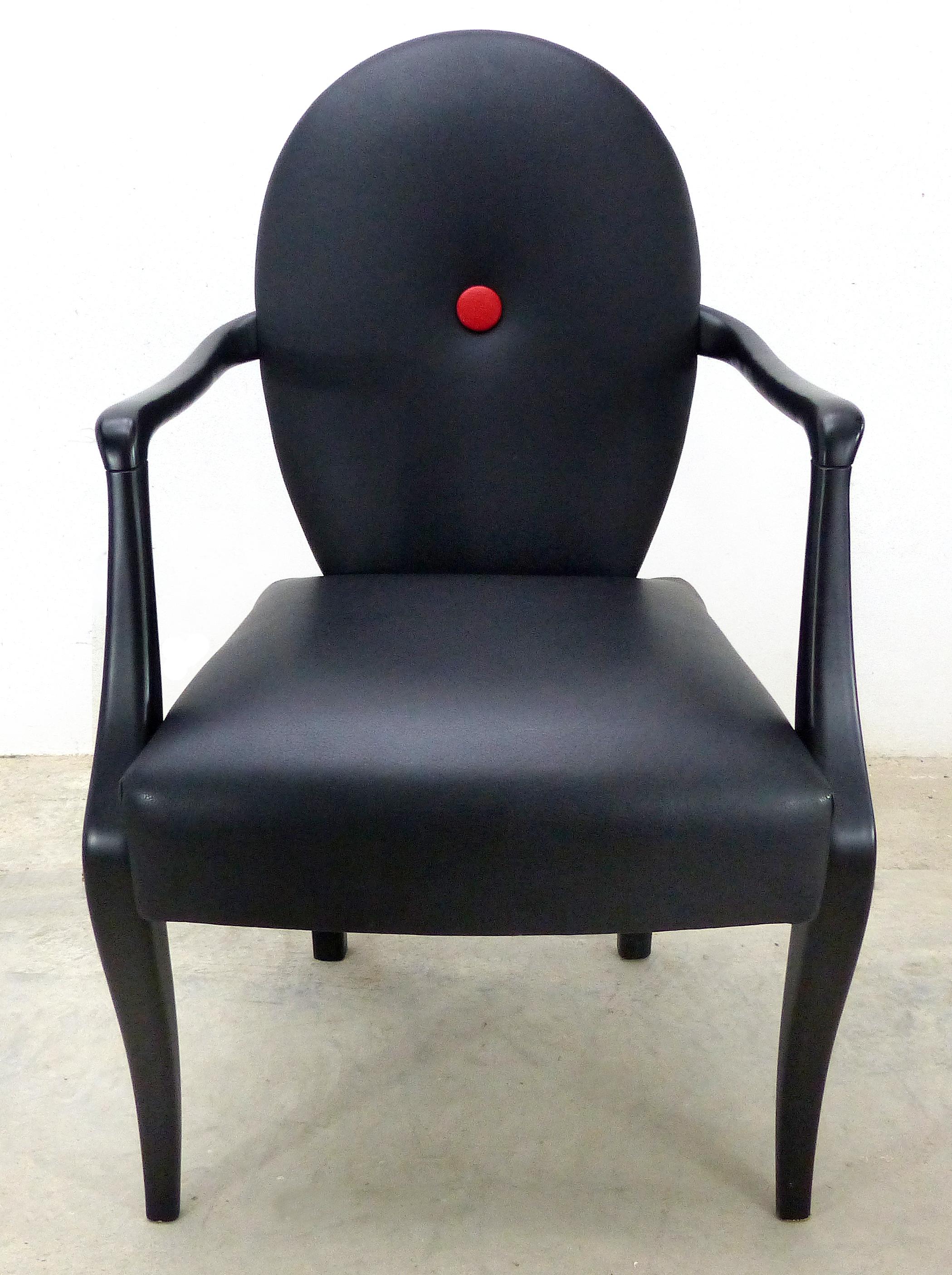 Offered for sale is a gracefully designed black leather chair from Belloni. Belloni is an Italian company that produces high-level craftsmanship with fine work and high-quality materials and attention to detail. The first workshop of the Belloni’s