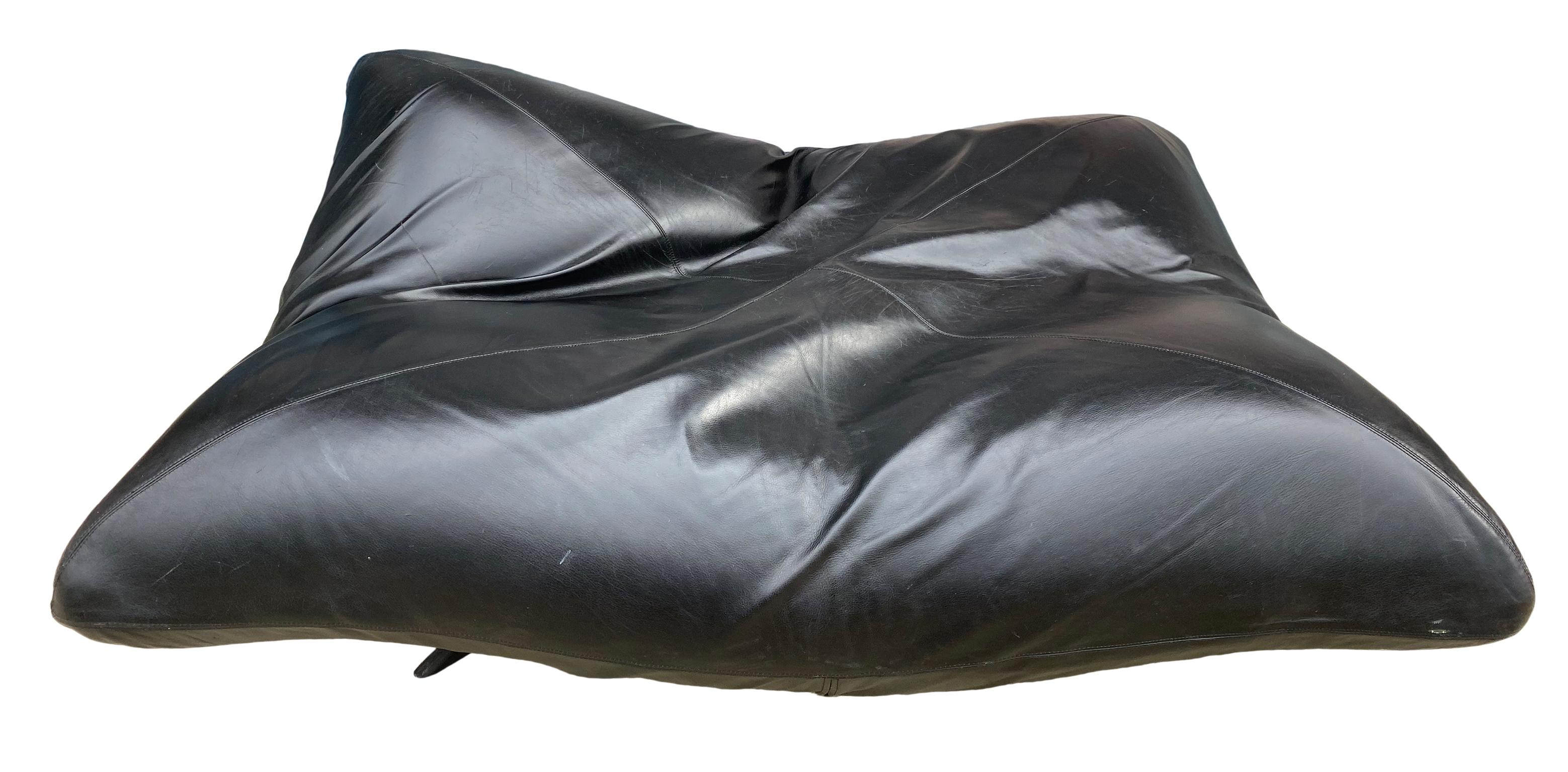 Fun designed black Leather articulating corner daybed sofa, Designed by Fabrizio Ballardini and Fulvio Forbicini, for Arflex circa 1980, made in Italy. Sofa has a metal base with 4 legs each corner ratchets up and locks into place very modular fun