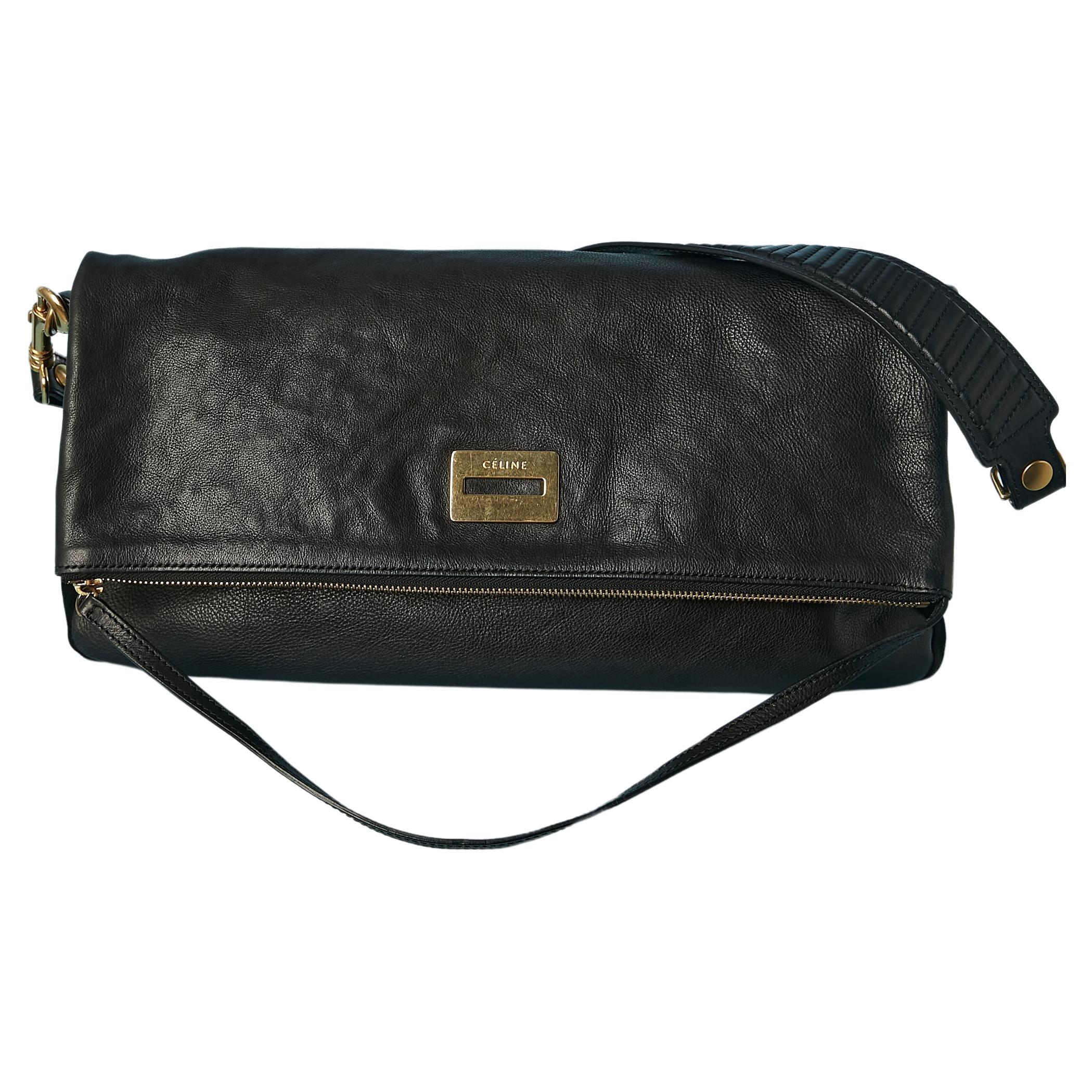 Black leather bag foiled on the top and gold zip closure Céline For Sale