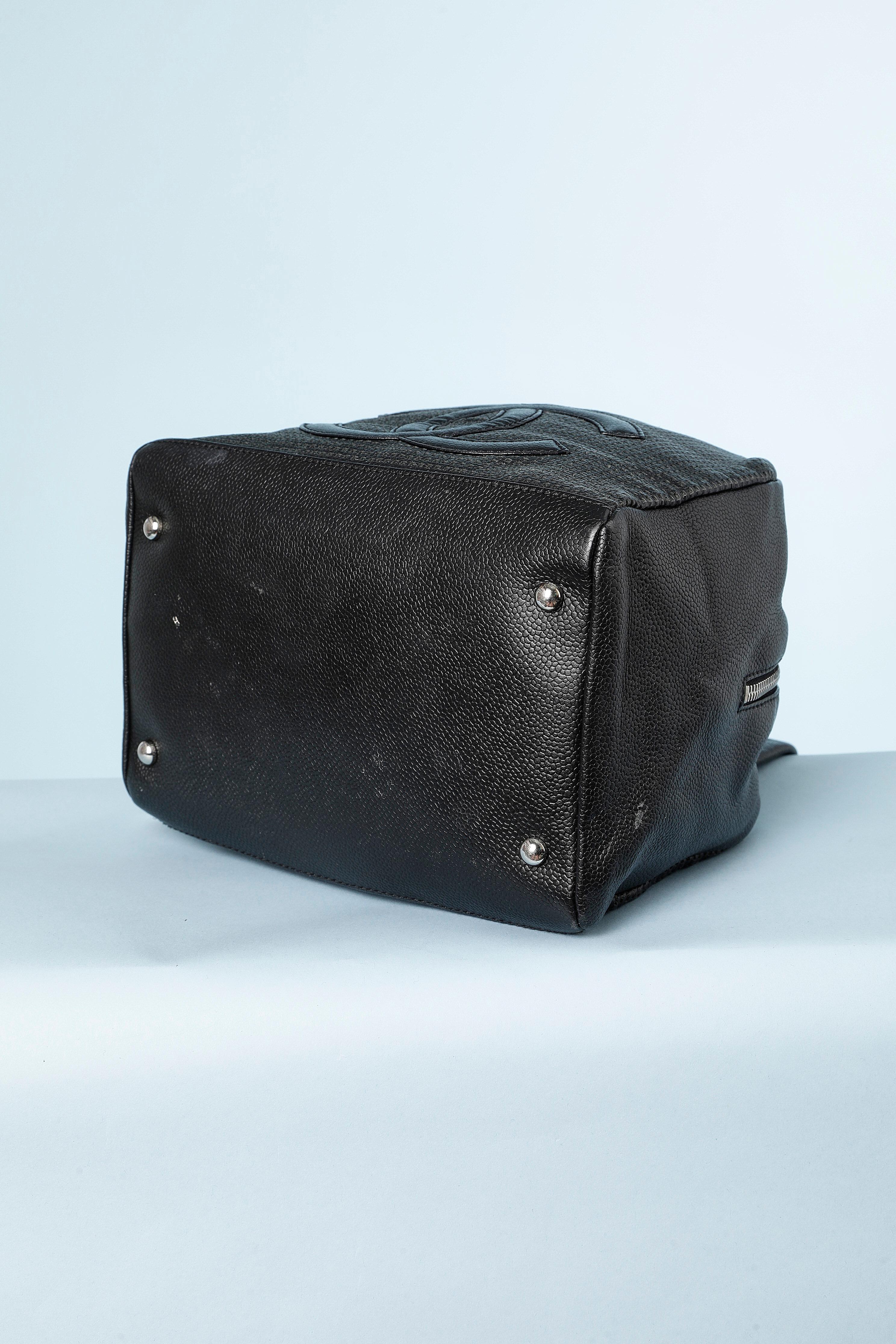 Black leather bag perforated with double C and zip Numbered In Excellent Condition In Saint-Ouen-Sur-Seine, FR