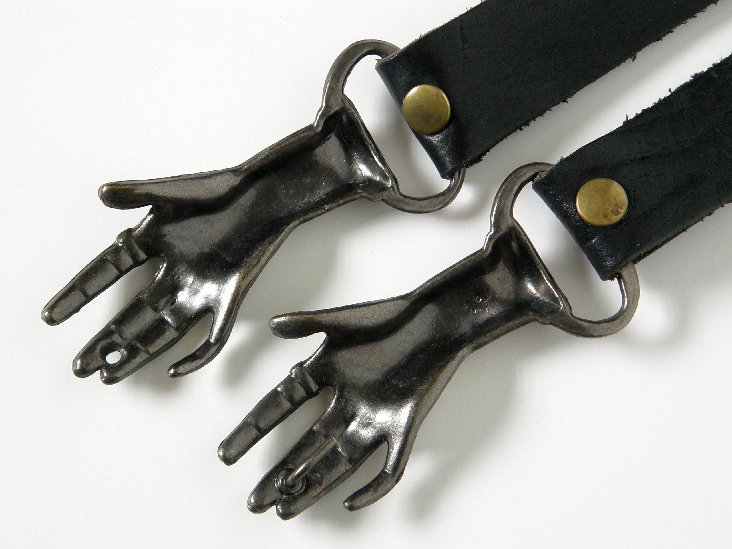 clasping hands belt