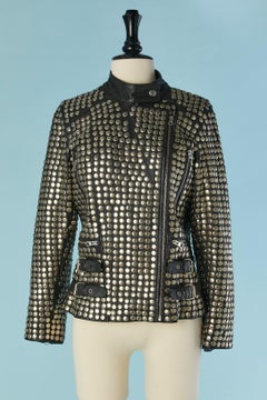 Black leather biker-jacket covered with silver nails NOORA