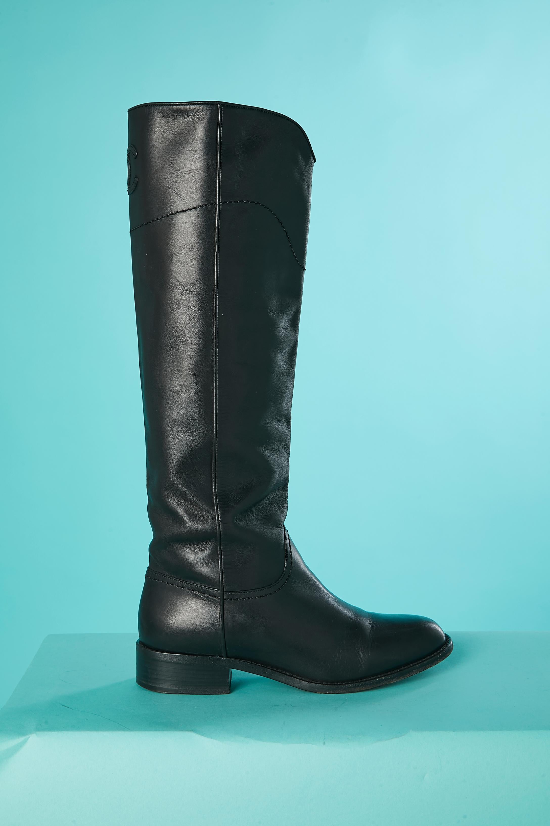 Black leather  ridding boots . Branded 