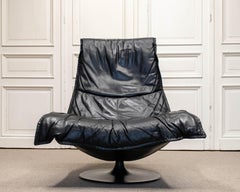 Silla giratoria mariposa de cuero negro a la manera de Hans Hopfer Roche Bobois
