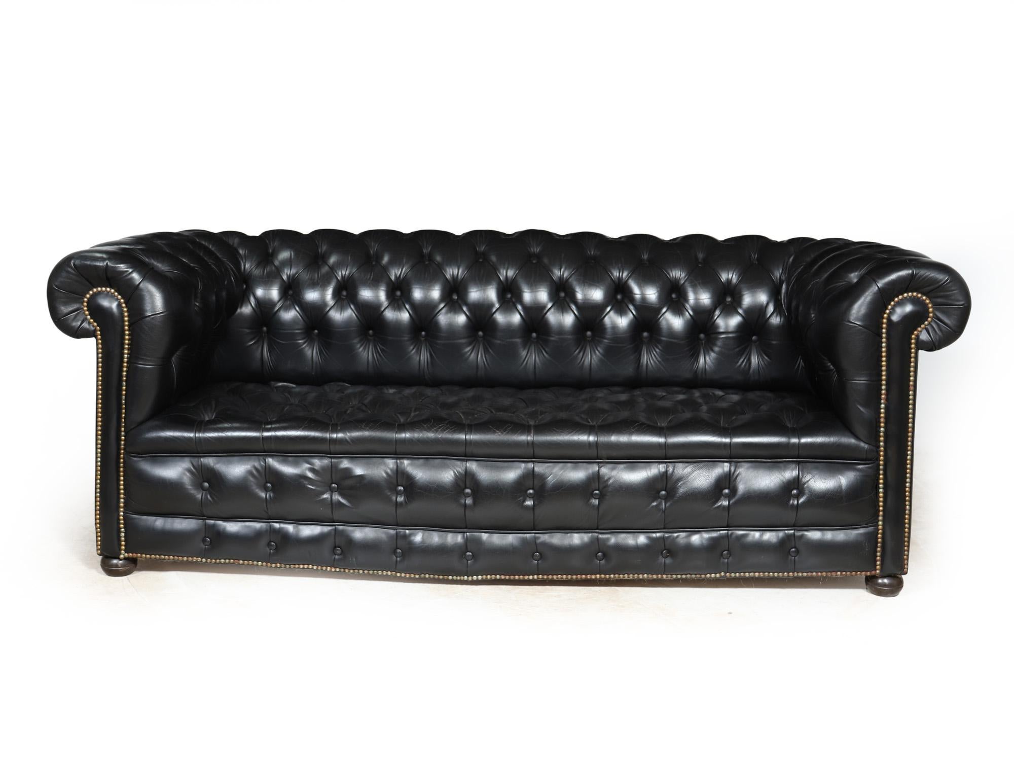 Vintage Black leather Chesterfield Sofa

A lovely example of a mid 20th century deep buttoned thick black leather chesterfield sofa, this chesterfield sofa has a buttoned seat and back making this more desirable than those with cushions, this sofa