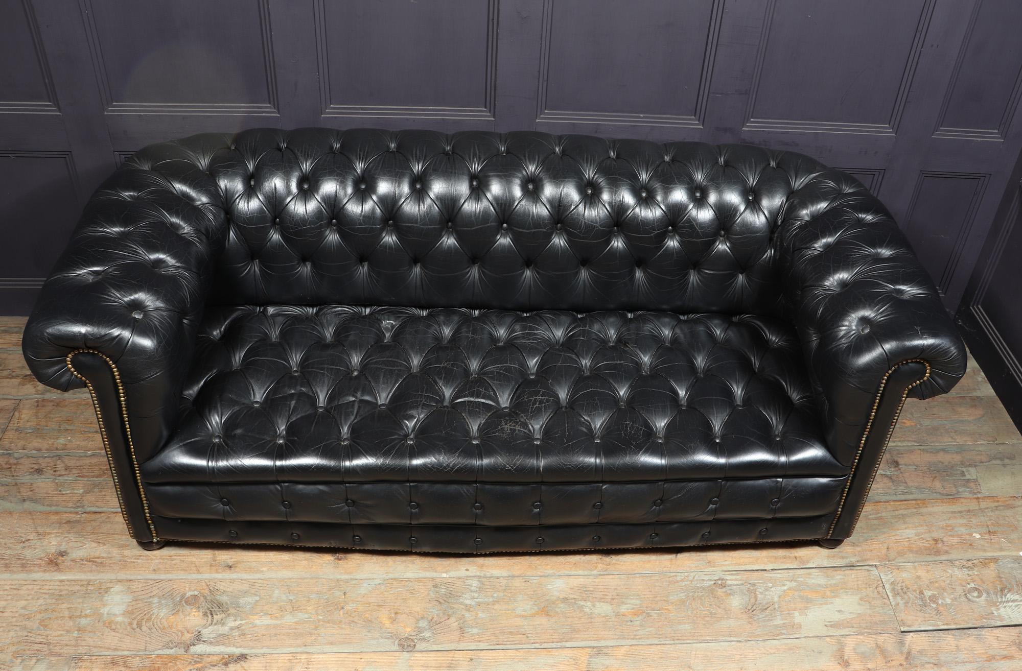 Mid-20th Century Black leather Buttoned seat Chesterfield Sofa