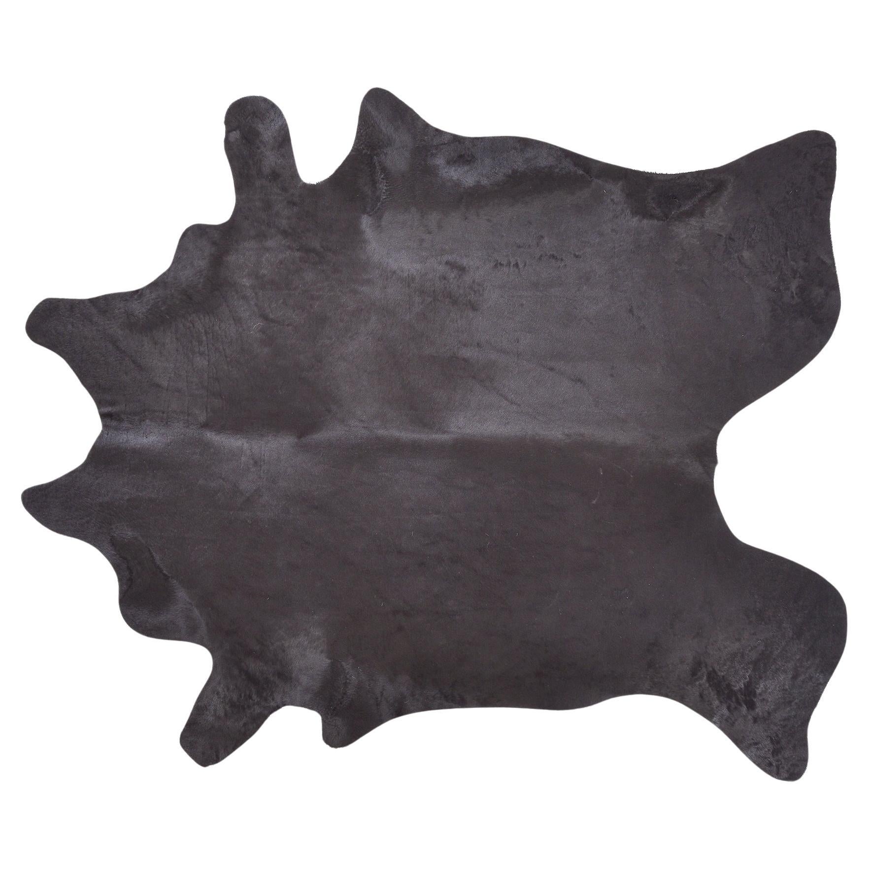 Alfombra de cuero negro