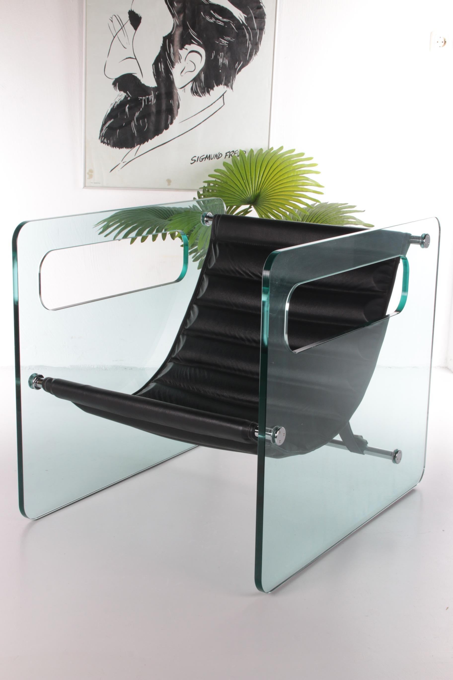 One of the most beautiful modernist transparent design chairs.

The perfect modern chair for your own minimalist glass house.

The Naked chair was designed by Giovanni Tommaso Garattoni in Italy. It is a minimalistic modern armchair.

This