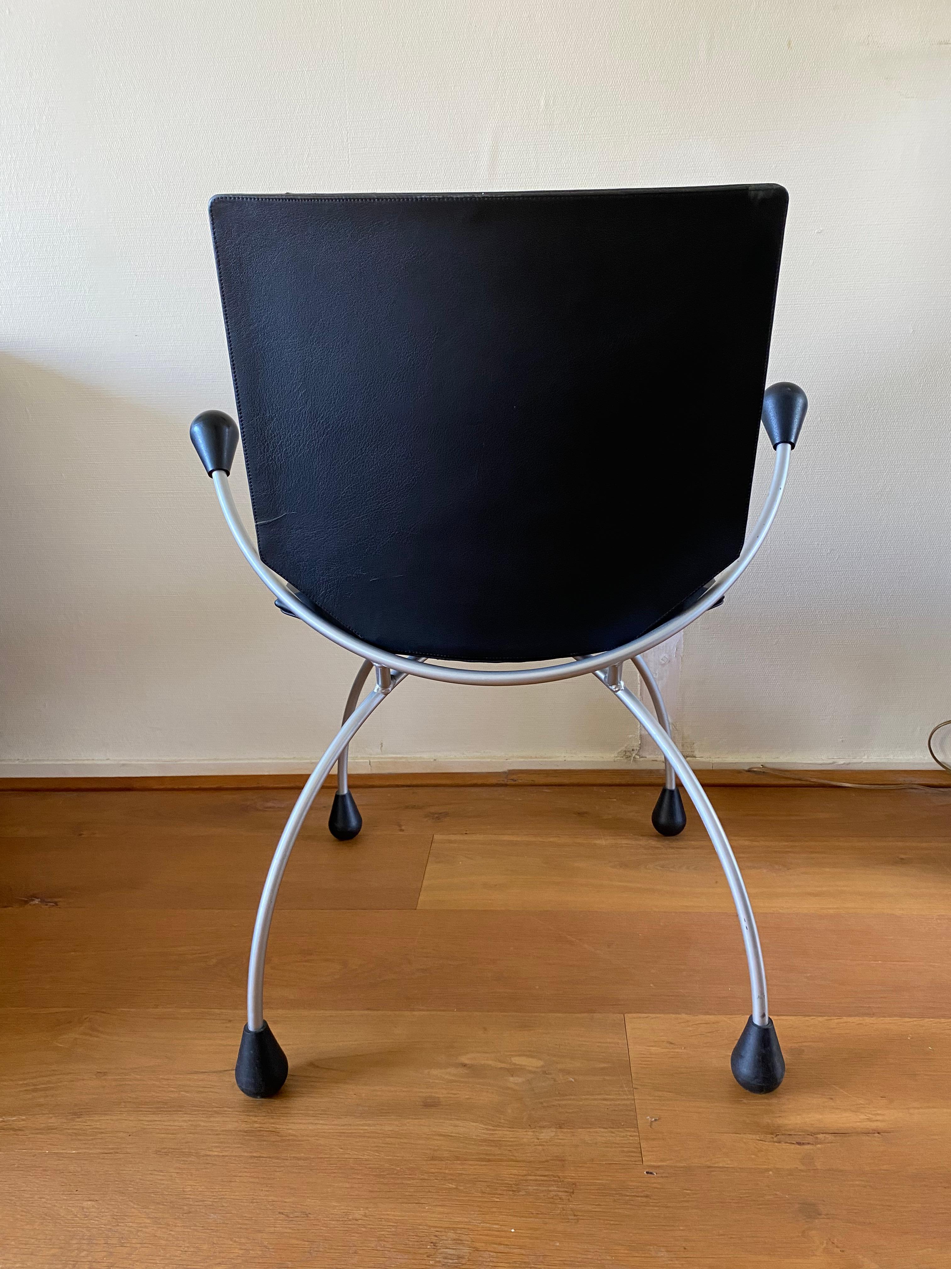Enameled Black Leather chair by Karel Boonzaaier and Pierre Mazairac For Sale