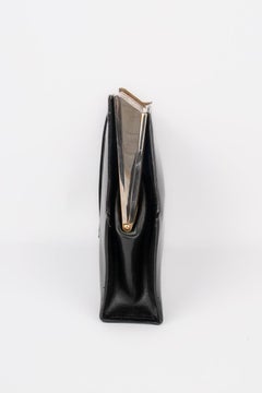 Black Leather Clutch Bag with Engraved Metal