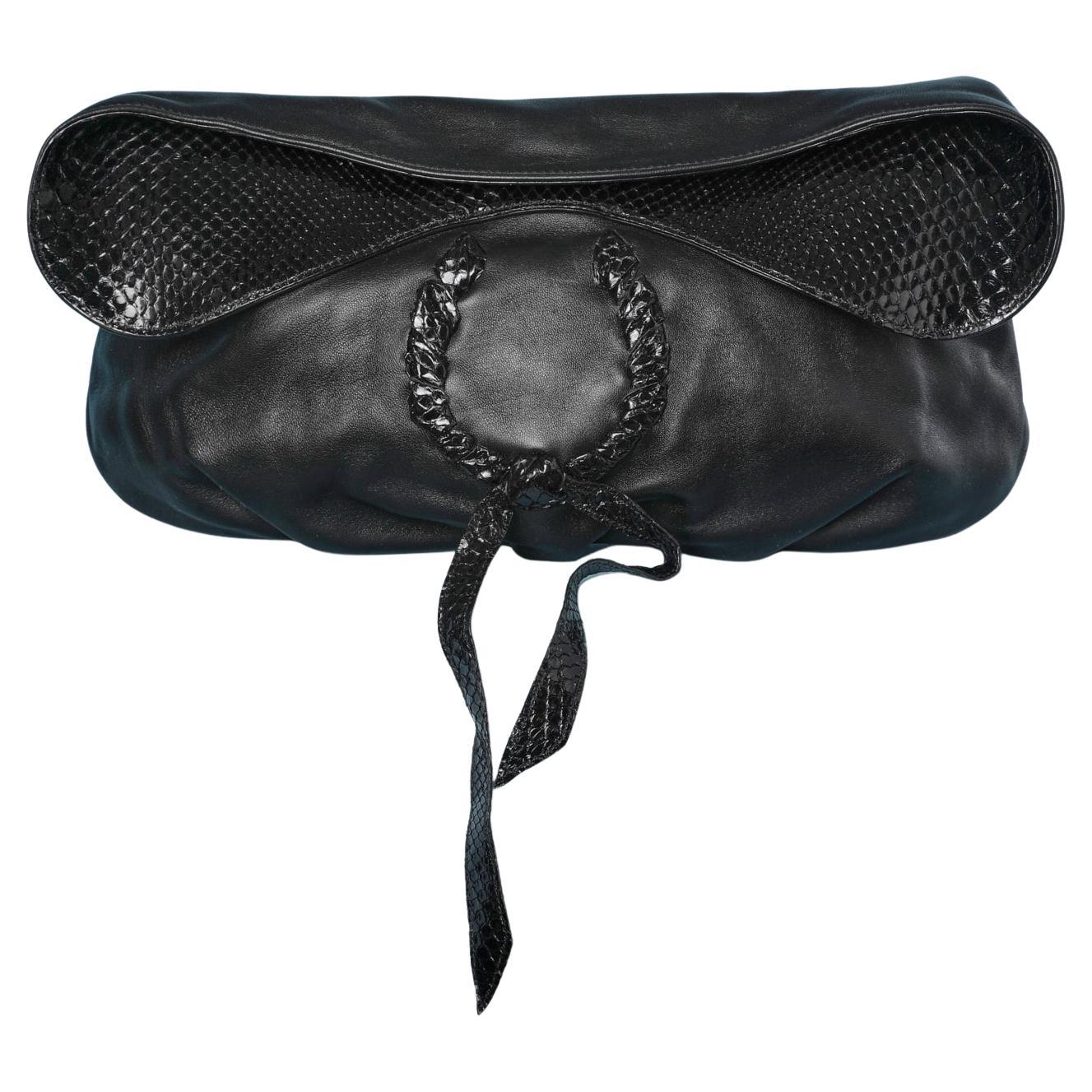 Black leather clutch NINA RICCI For Sale