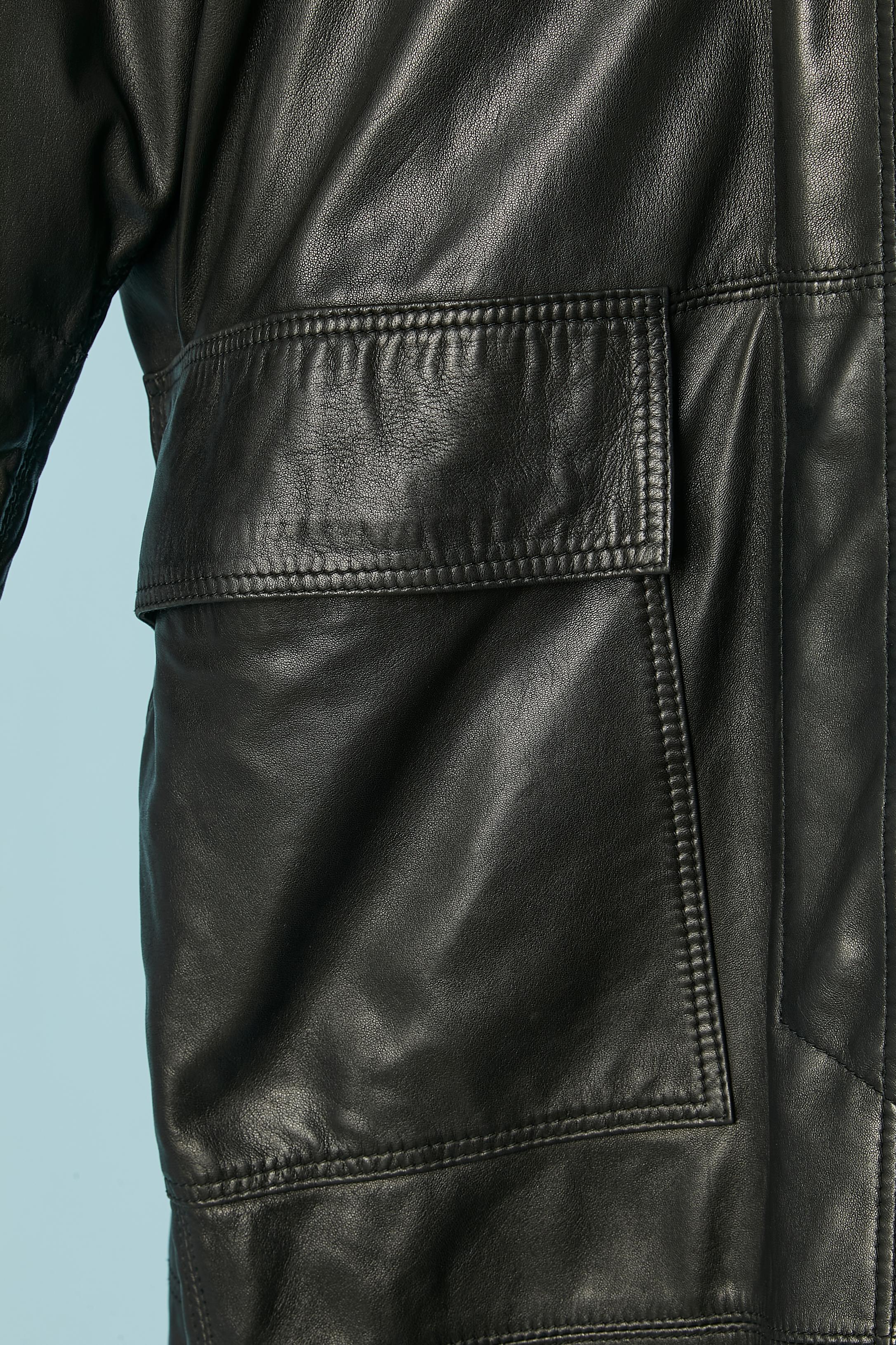 Women's Black leather coat with brown wool lining and snap closure ALAÏA Circa 1990