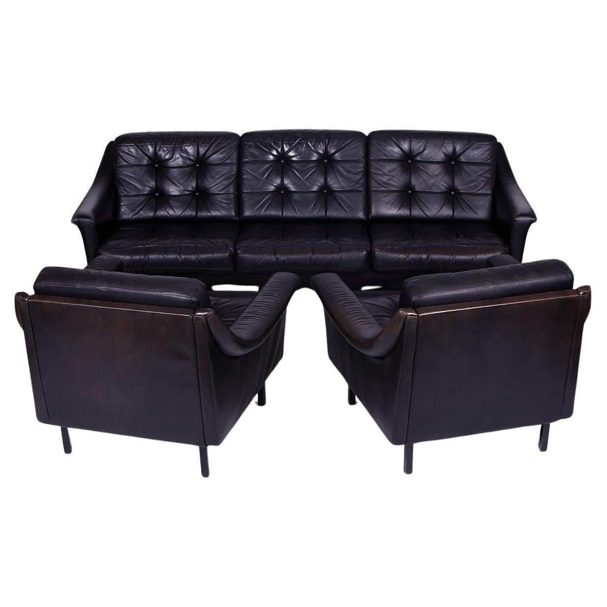 Black leather couch and 2 armchairs  Germany 1960s For Sale