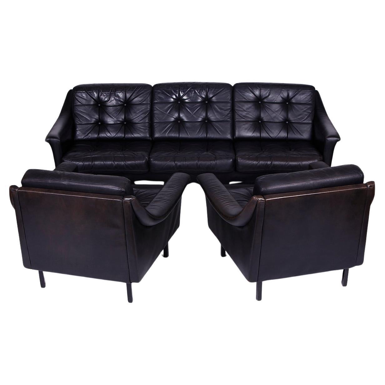 Black leather couch and 2 armchairs  Germany 1960s  For Sale