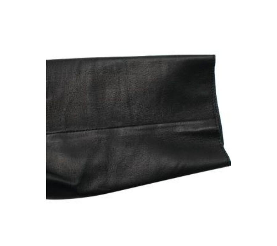 black leather blazer and prada bag