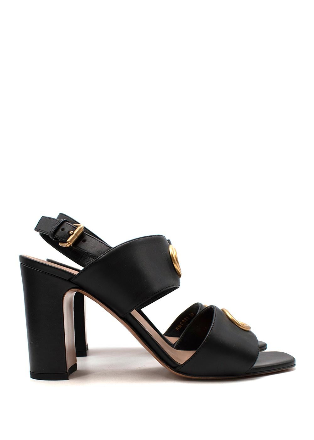 Valentino Black Leather Cut-Out Block Heeled Sandals

- Double strap sandals, with decorative gold-tone metal-edged cut out
- Slingback adjustable buckle strap
- Set on a high block heel

Materials: 
100% Leather 

Made in Italy 
9/10 very good