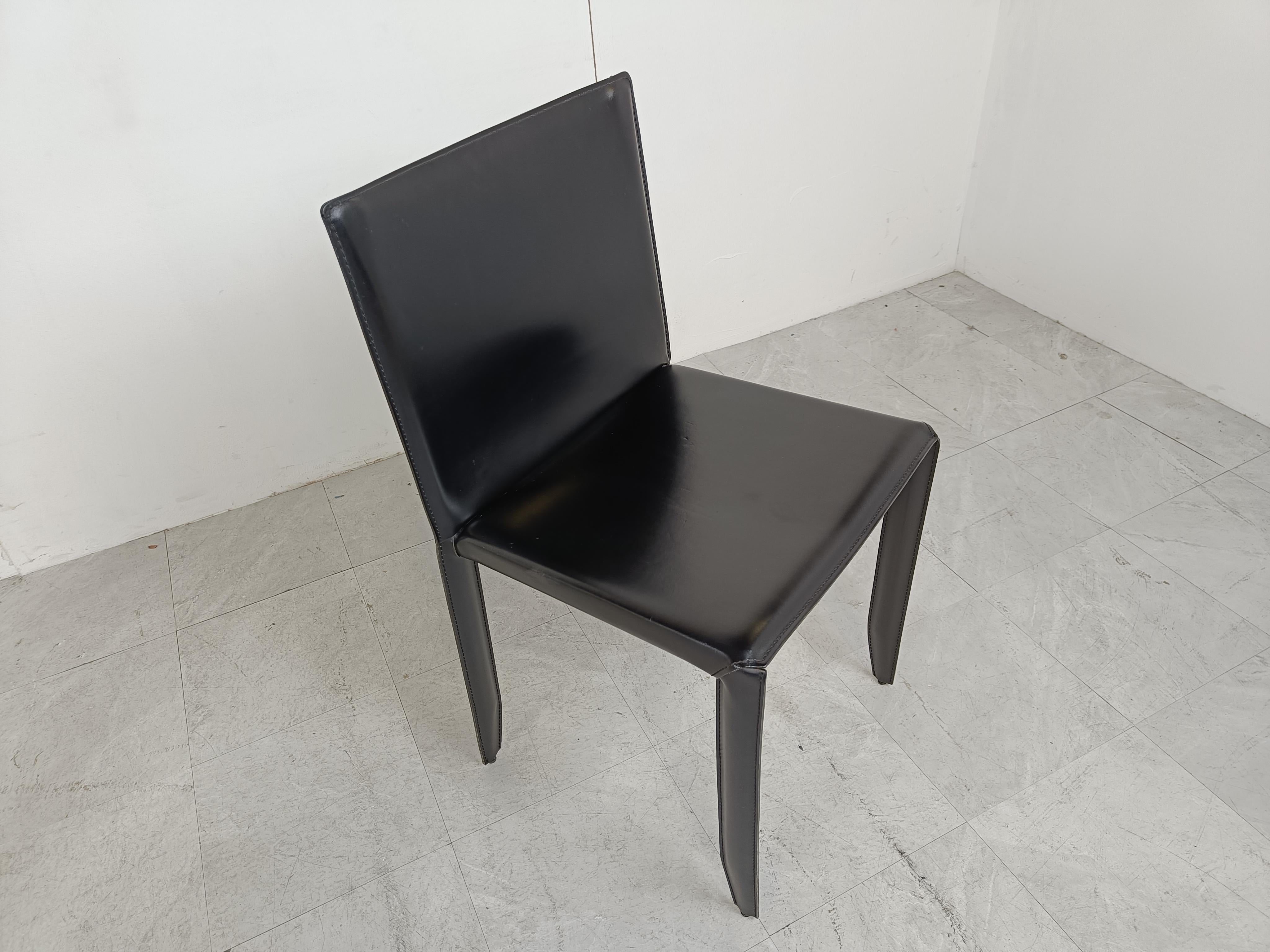 Vintage black leather upholstered dining chairs by Cattelan italy.

Comfortable dining chairs with nicely stiched leather.

Good overal condition

1980s - Italy

Dimensions
Height: 83cm/32.67