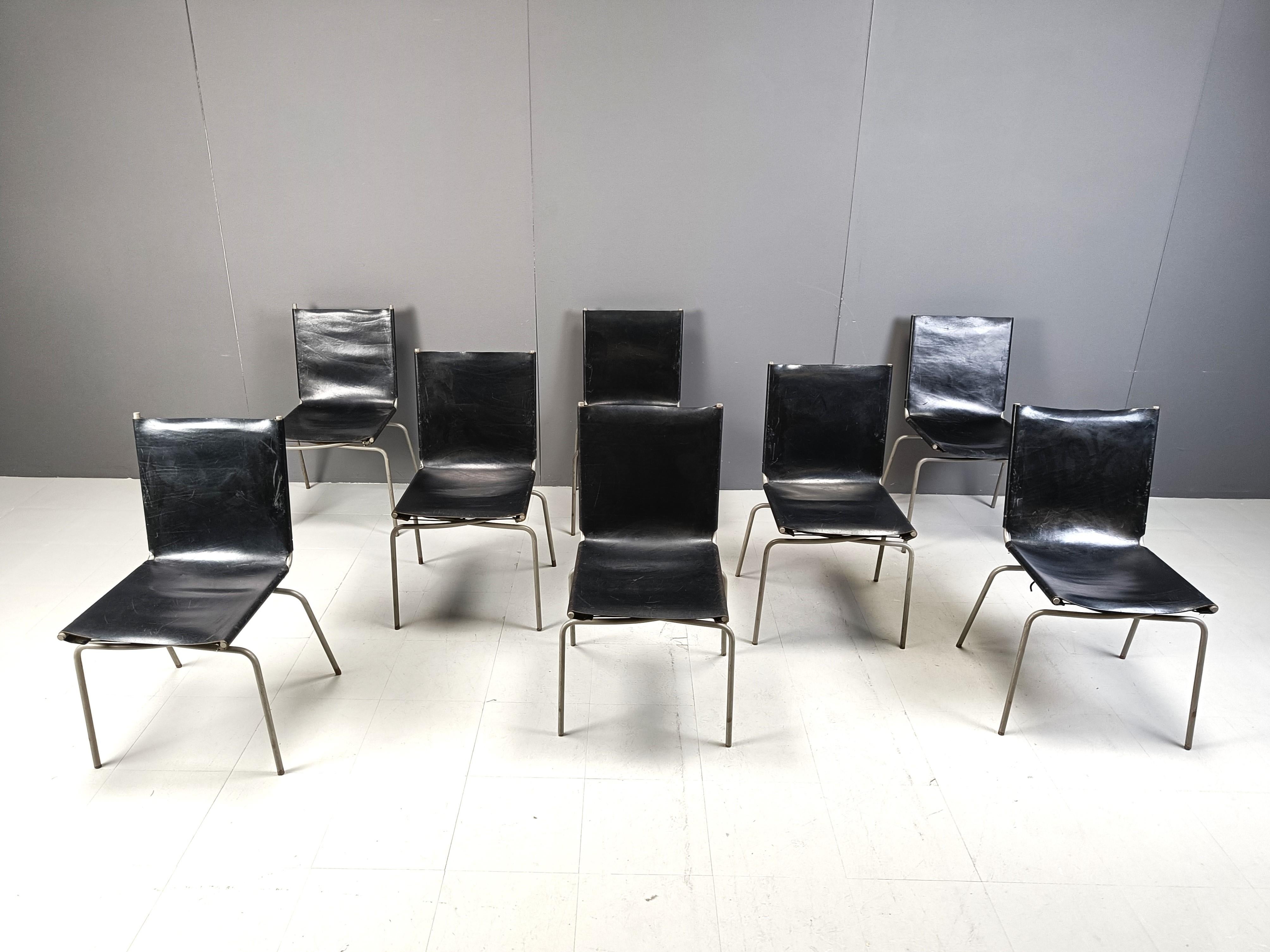Fabiaan Van Severen, dining chairs, patinated black leather, tubular steel, lace, Belgium, 1997.

Distinct pair of dining chairs by Belgium designer Fabiaan Van Severen. Created in 1997, this design features a patinated leather seat and backrest