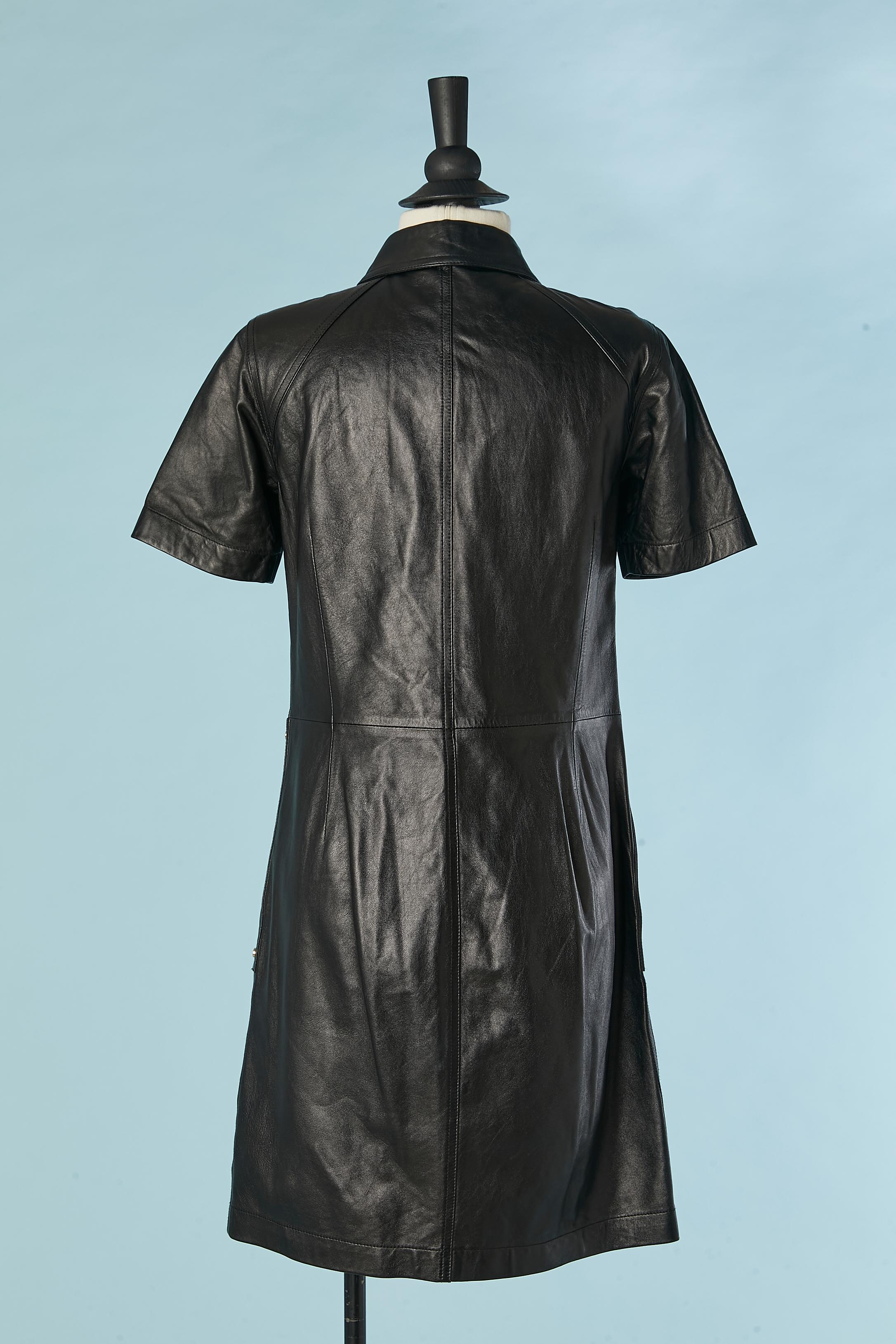 Black leather dress with gold metal snap and zipped pocket For Sale 1