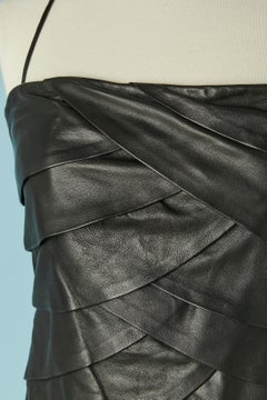 Abito in pelle nera con rouches tagliate VAKKO