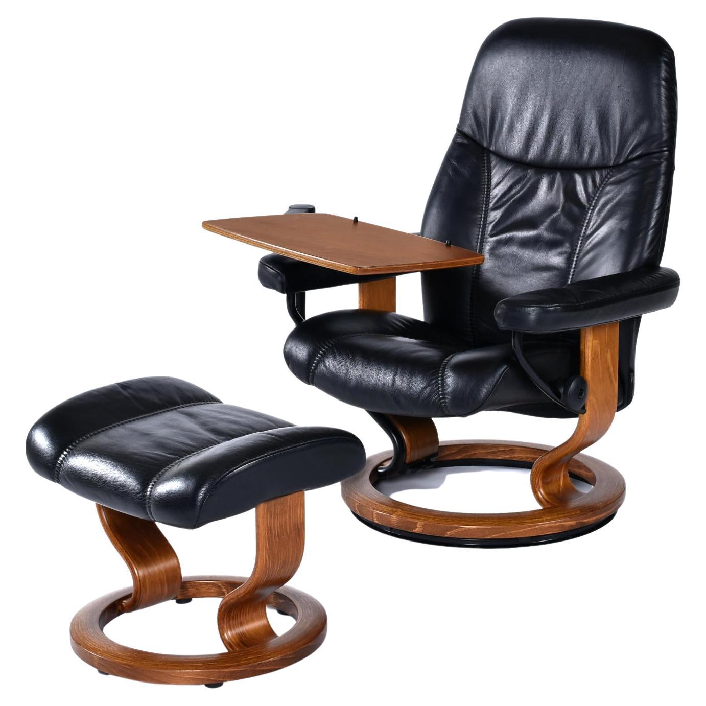Black Leather Ekornes Stressless Recliner with Ottoman and Telescoping Table