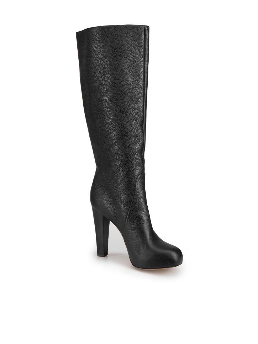 CONDITION is Very good. Hardly any visible wear to boots is evident on this used Escada designer resale item. These boots come with original bust bag.



Details


Black

Leather

Knee high boots

Eyelets accent

Round toe

High heel





Made in