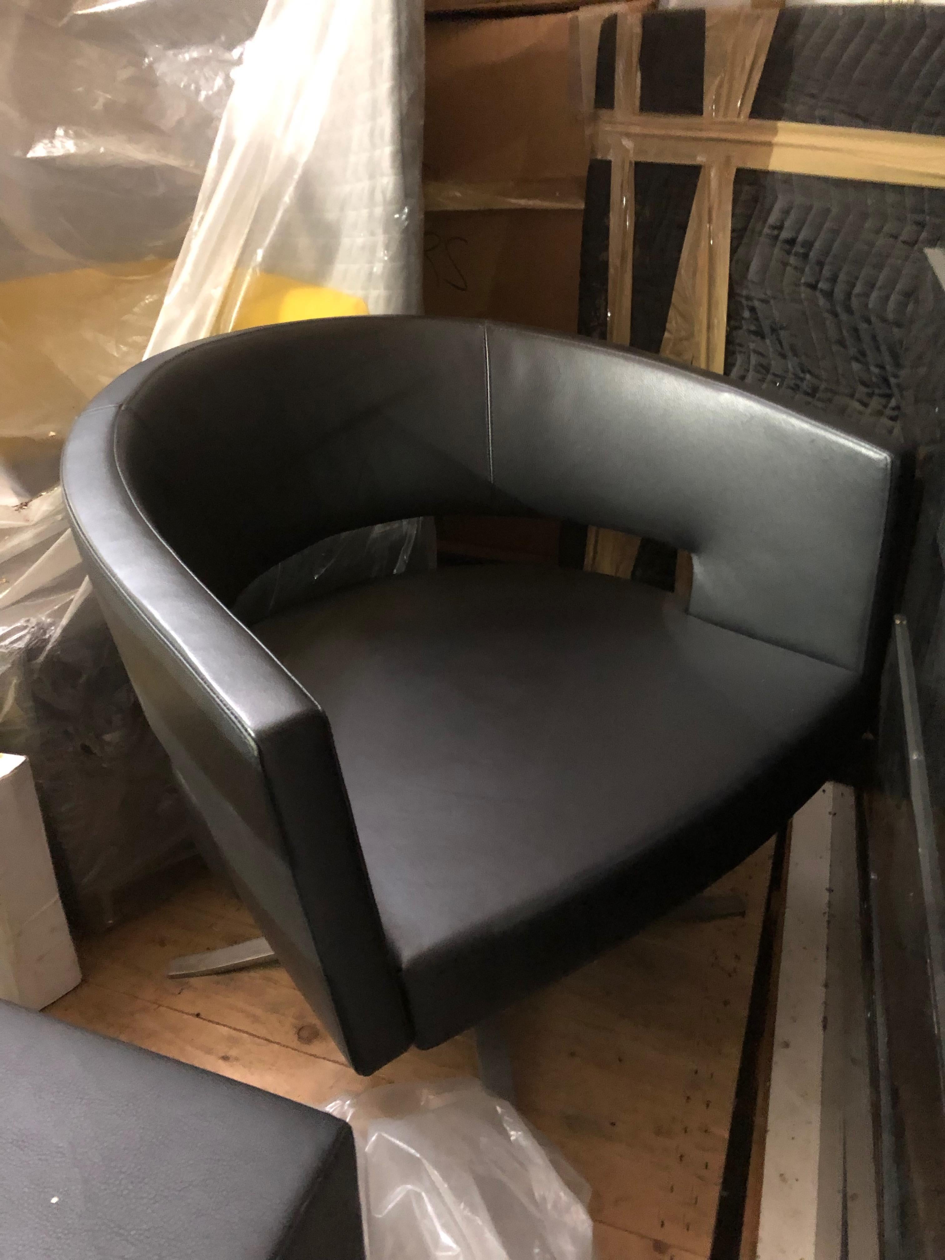 Contemporary Black Leather Four-Star Base Turner Armchair