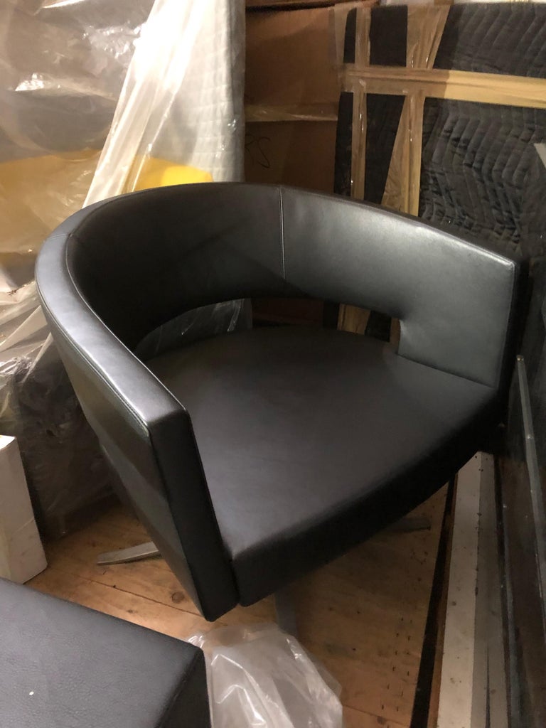 Black Leather Four-Star Base Turner Armchair For Sale at 1stDibs