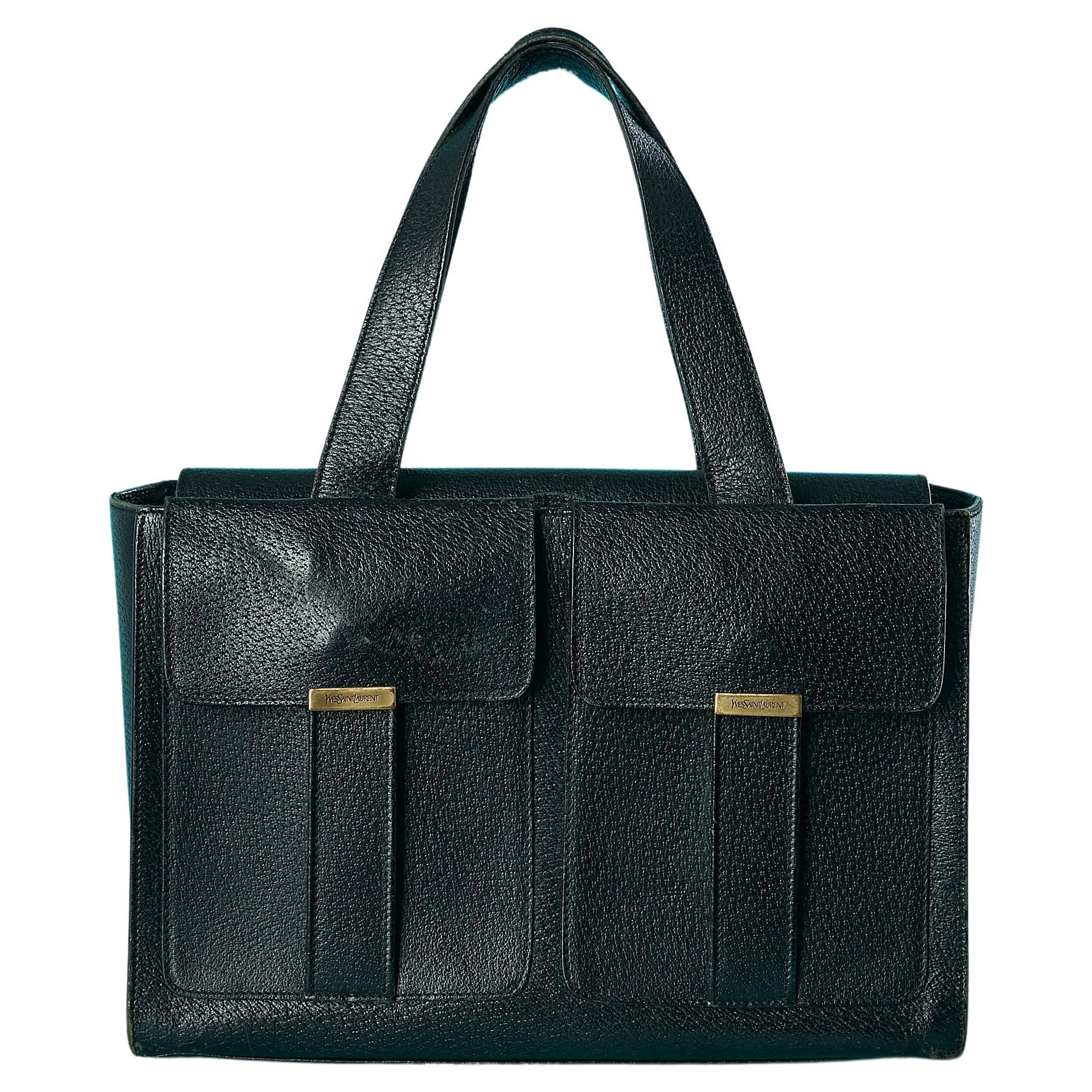 Black leather hand bag with 2 front pockets Yves Saint Laurent